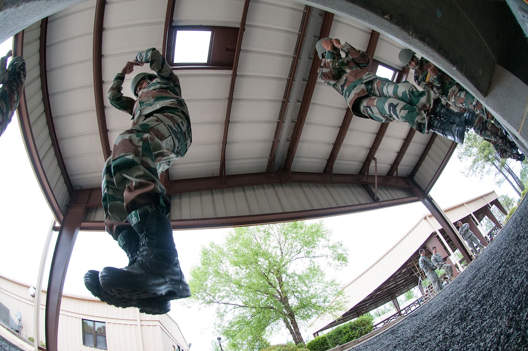 Indian army paratroopers assigned to the 50th Independent Para Brigade practice parachute landing falls during airborne refresher training at the 82nd Airborne Division’s Advanced Airborne School during Yudh Abhyas 2013 on Fort Bragg, N.C., May 3, 2013.