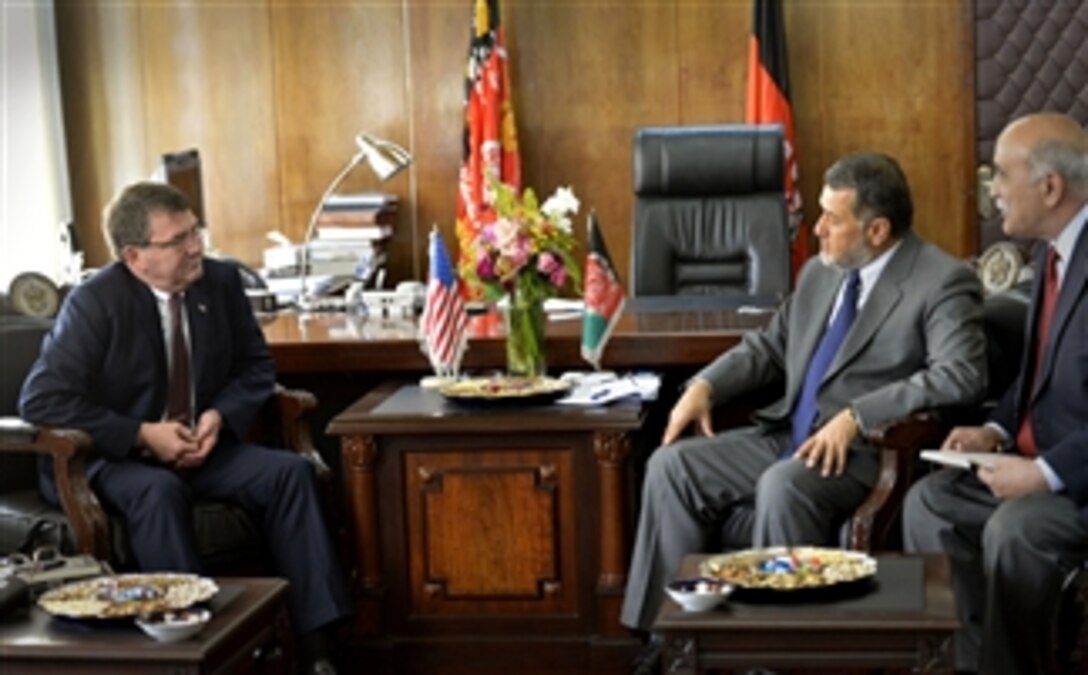 Deputy Secretary of Defense Ashton B. Carter, left, meets with Afghanistan's Minister of Defense Bismullah Muhammadi Khan, second from right, in Kabul, Afghanistan, on May 12, 2013.  Carter congratulated the minister on the progress made by Afghan forces as they move toward taking the lead for security throughout Afghanistan.  