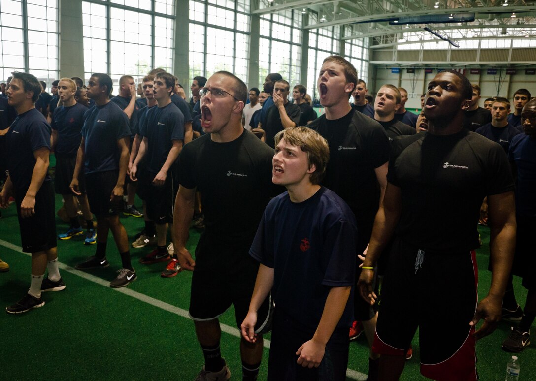Gunnery Sgt. Roberto Barba Jr., a drill instructor at the United States Naval Academy, gives instruction to a poolee from Marine Corps Recruiting Station Baltimore during RS Baltimore’s statewide pool function at the USNA, May 11.