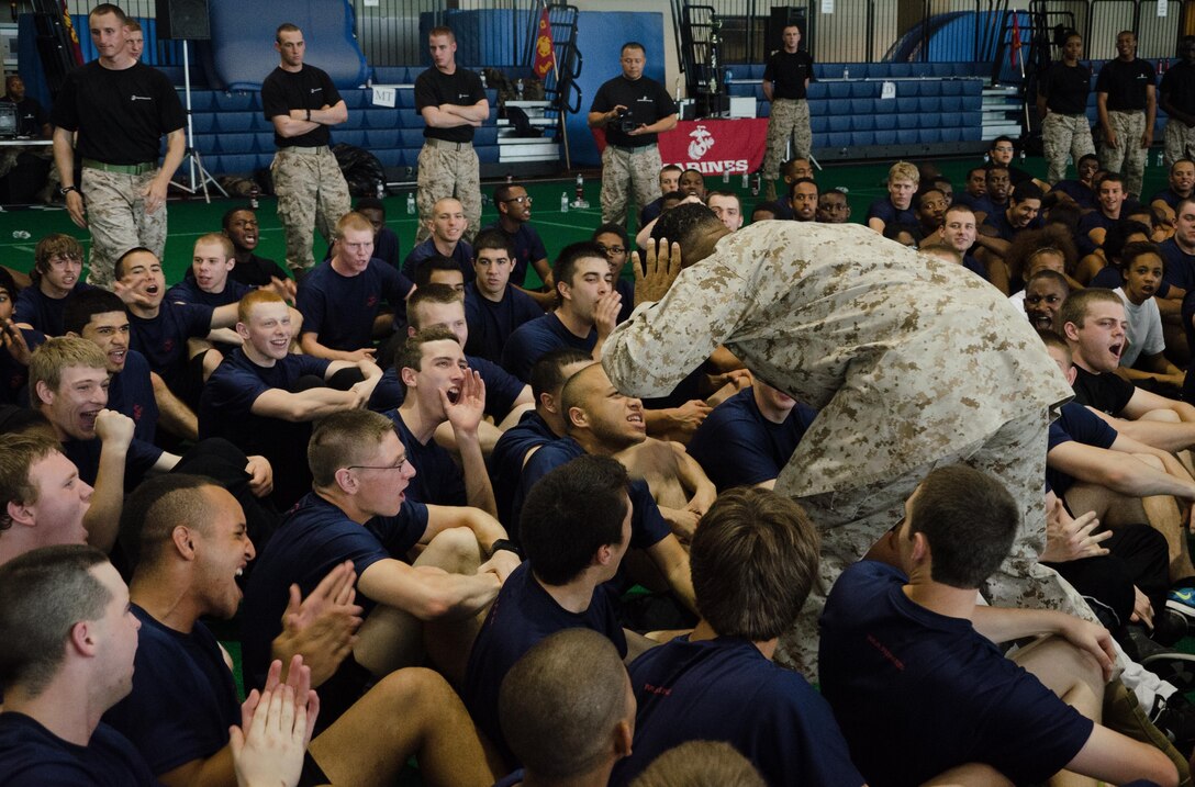 Sergeant Maj. Brian Taylor, the sergeant major for Marine Corps Recruiting Station Baltimore, encourages poolees from RS Baltimore to get loud during their statewide pool function at the United States Naval Academy, May 11.