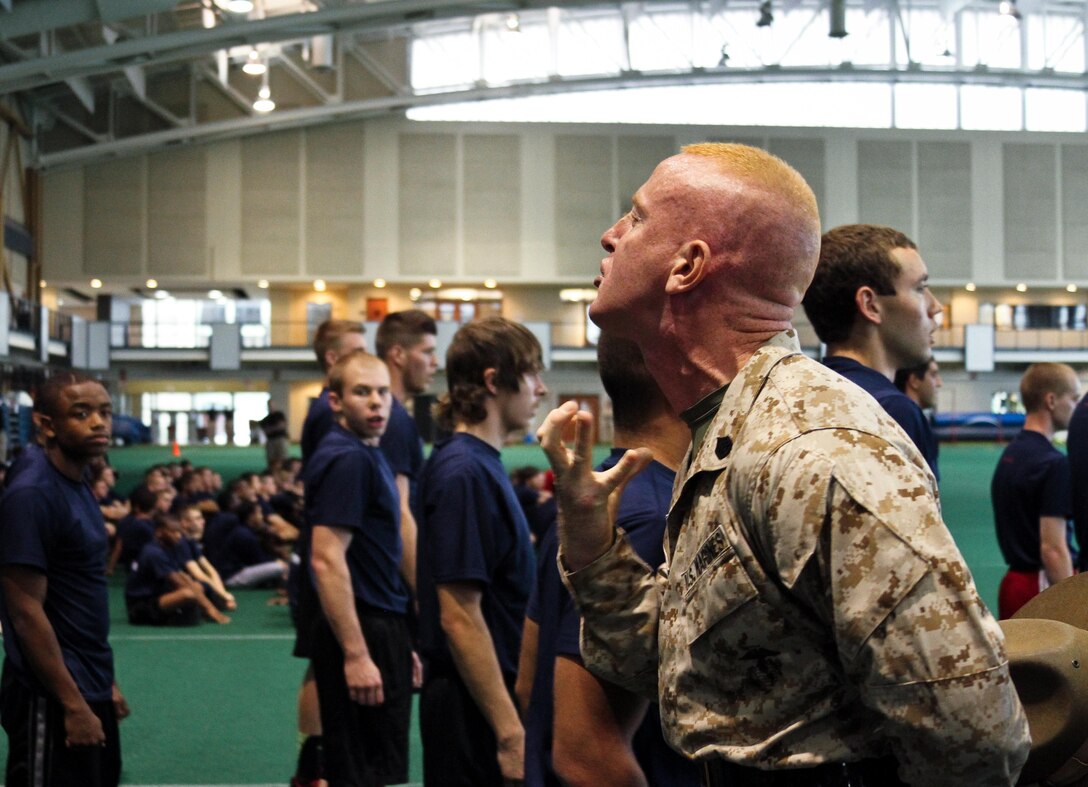 Staff Sgt. Steven T. Kern, a drill instructor from Marine Corps Recruit Depot Parris Island, explains to poolees from Marine Corps Recruiting Station Baltimore how to project their voices during RS Baltimore’s statewide pool function at the United States Naval Academy, May 11. 