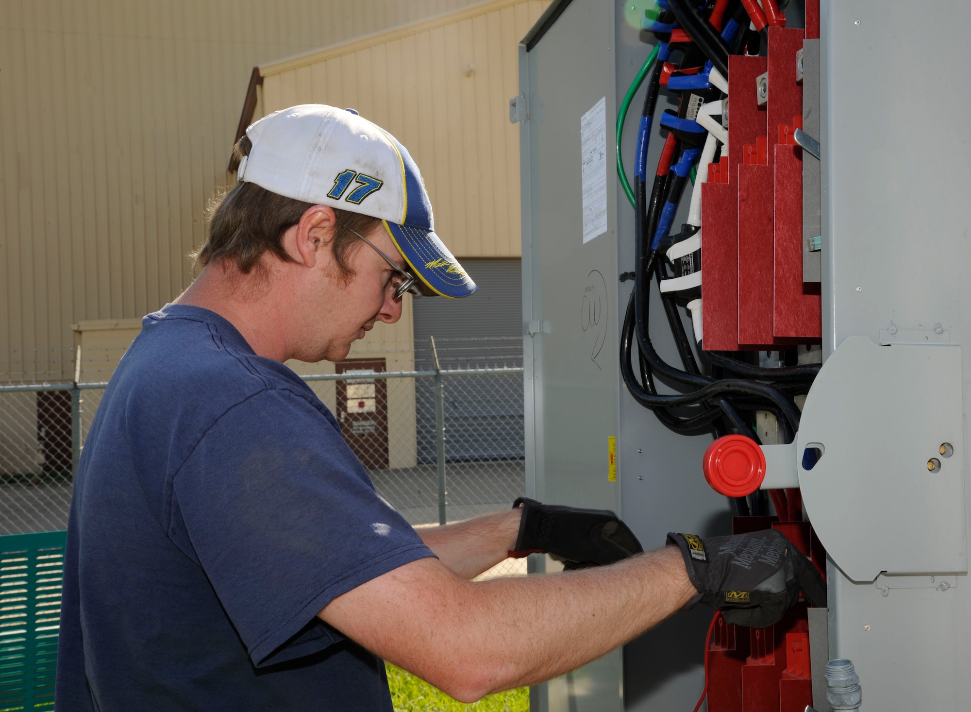 Stephen Mahanna, 2nd Civil Engineer Squadron Electrical Power Production, checks for power during the installation of a generator on Barksdale Air Force Base, La., May 14, 2013. Power production's responsibilities include maintaining backup generators and power facilities throughout Barksdale. (U.S. Air Force photo/Airman 1st Class Andrew Moua)