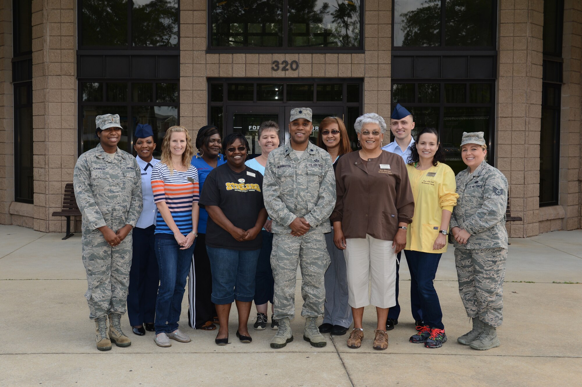 The parent advisory committee and Lt. Col. Dalian Washington, 20th Force Support Squadron commander, gathered at the Child Development Center at Shaw Air Force Base, S.C., for a breakfast with child care providers to kickoff National Provider Appreciation Week, May 8, 2013. The week recognizes child care providers, teachers and other educators for their work. (U.S. Air Force photo by Airman 1st Class Krystal M. Jeffers/Released)