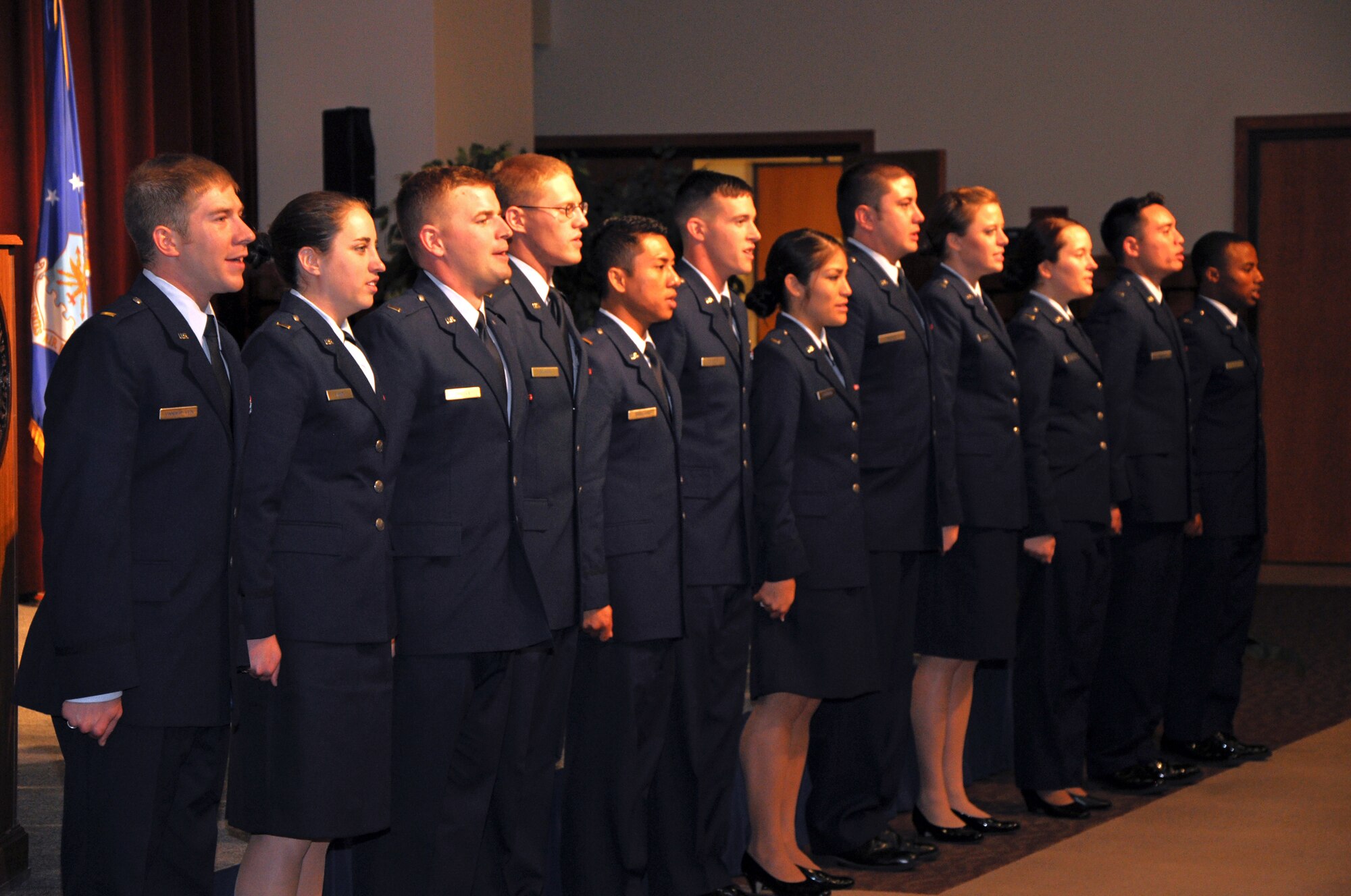 SAN ANGLEO, Texas – The 12 new second lieutenants from Angelo State University’s Air Force ROTC Detachment 847 sing the Air Force song during a ROTC commissioning ceremony at the ASU Houston Harte University Center here, May 10. These lieutenants will fill air battle, combat systems, combat missiles, logistics or pilot positions in the Air Force. (U.S. Air Force photo/ Airman 1st Class Joshua Edwards)
