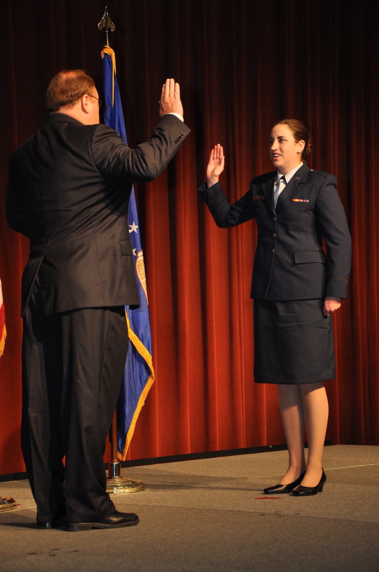 SAN ANGLEO, Texas - 2nd Lt. Allysen Vance, former Angelo State University Air Force ROTC Detachment 847 cadet, swears into service at the ASU Houston Harte University Center here, May 10. Vance chose Retired Col. Robert Vance, her father, to commission her. (U.S. Air Force photo/ Airman 1st Class Joshua Edwards)