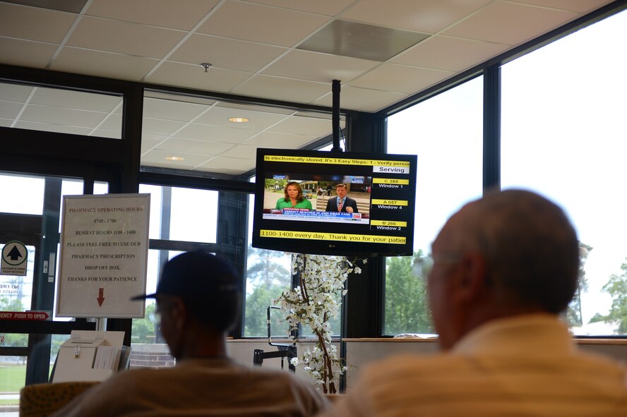 Team Shaw members enjoy the convenience of cable while waiting to be serviced at the base hospital, Shaw Air Force Base, S.C., May 8, 2013. The facilitation of cable throughout the base is one of the lesser known responsibilities of the 20th Communications Squadron. (U.S. Air Force photo by Airman 1st Class Daniel Blackwell/Released)