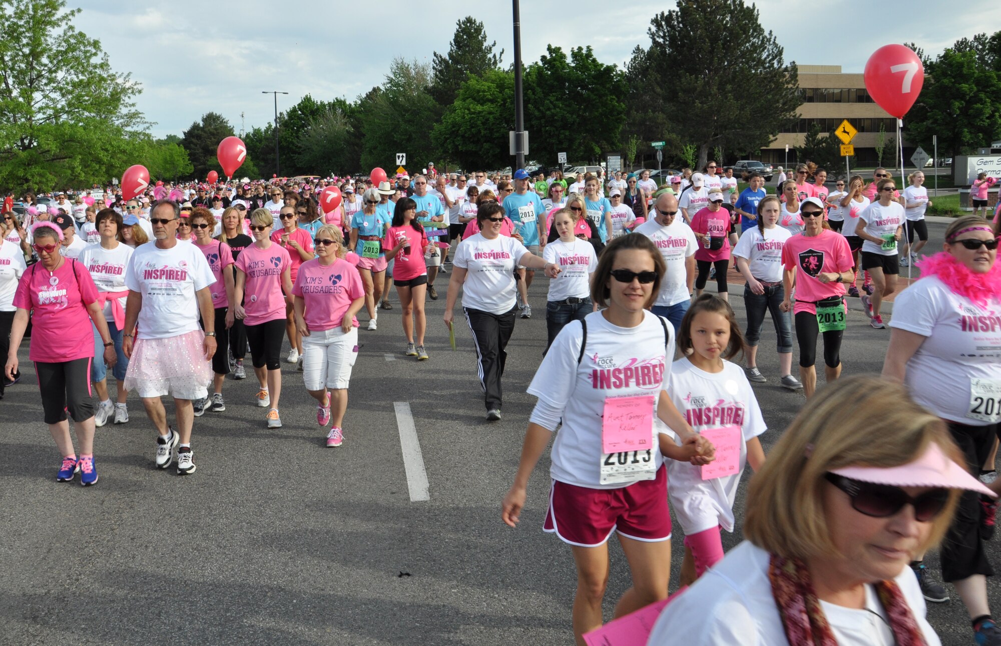 U.S. Air Force Master Sgt. Christy Funk, 366th Communication Squadron client support center section chief, walks with her daughter May 11, 2013, in Boise, Idaho. Funk and her daughter were two of more than 12,000 people who came out to show support for the event. (U.S. Air Force photo by Senior Airman Benjamin Sutton/Released)