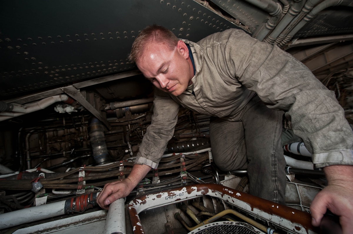 On the flightline with maintainers hydraulics > Air Combat Command