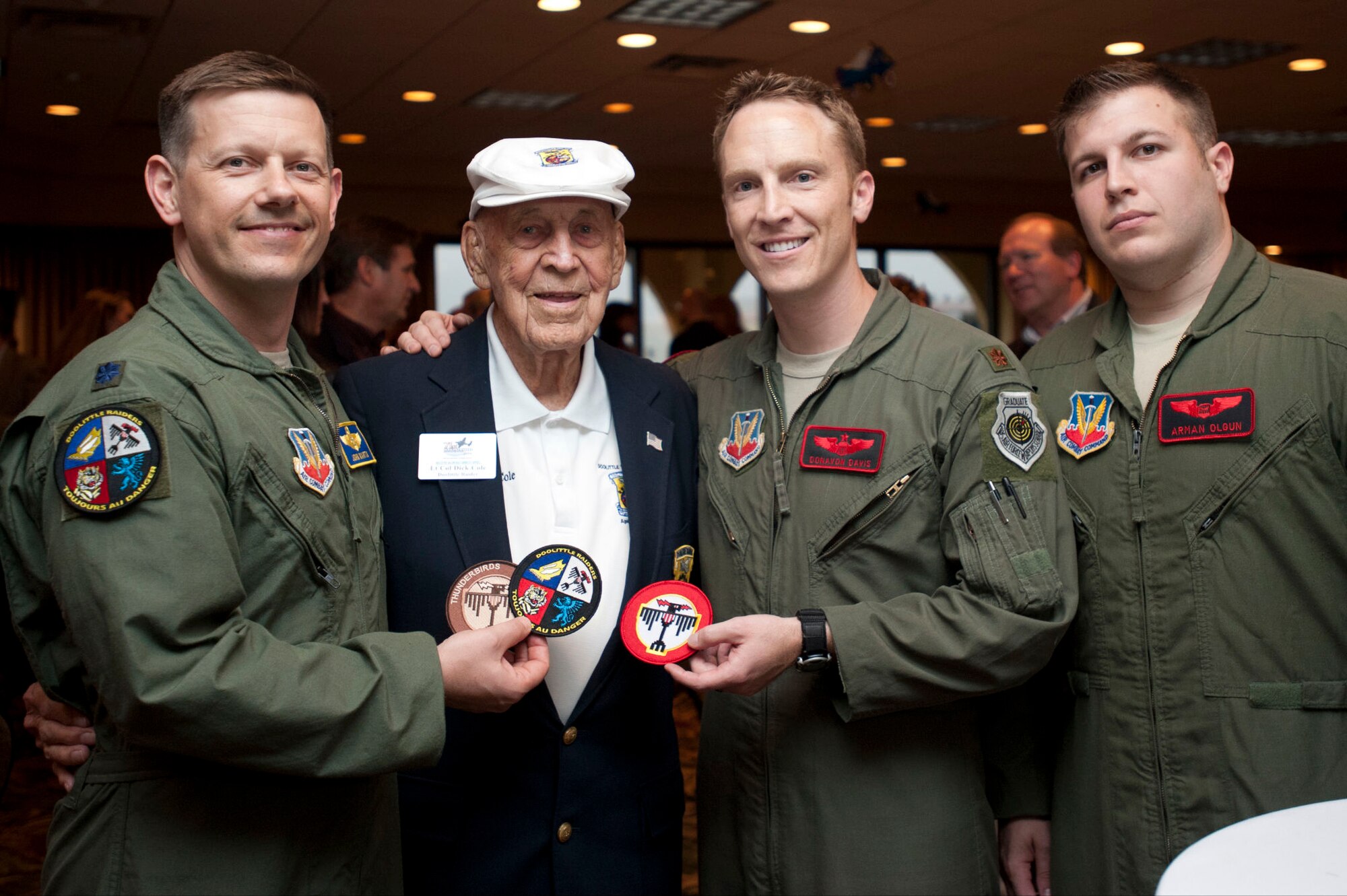 (Left to right) Lt. Col. John Martin, 28th Operations Group deputy commander, Lt. Col. Dick Cole, retired, Doolittle Raider co-pilot crew 1, Maj. Donavon Davis, 34th Bomb Squadron and 1st Lt. Arman Olgun, 34th Bomb Squadron, pose for a photo during a reception, April 19, 2013. Martin, Davis and Arman are from Ellsworth Air Force Base, SD and are part of the present Doolittle Raiders. (U.S. Air Force Photo by Senior Airman Carlin Leslie)
