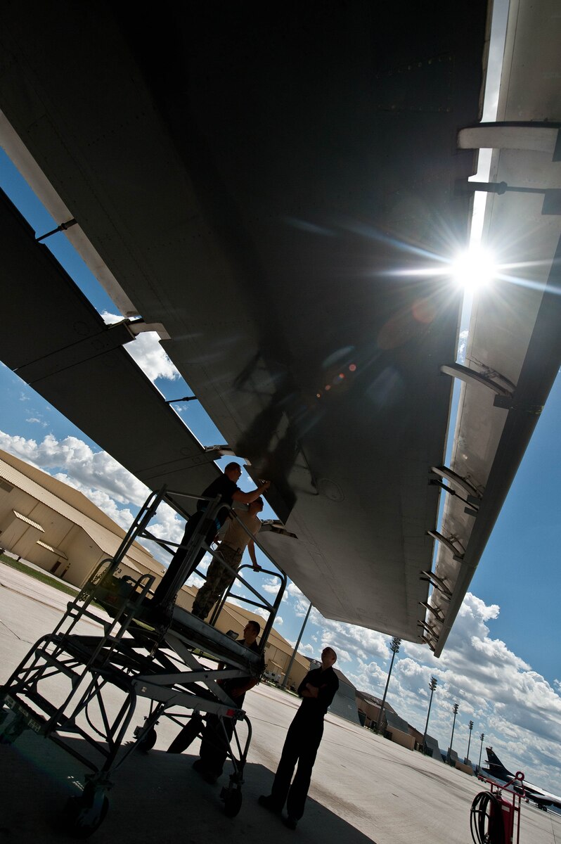 On the flightline with maintainers hydraulics > Air Combat Command