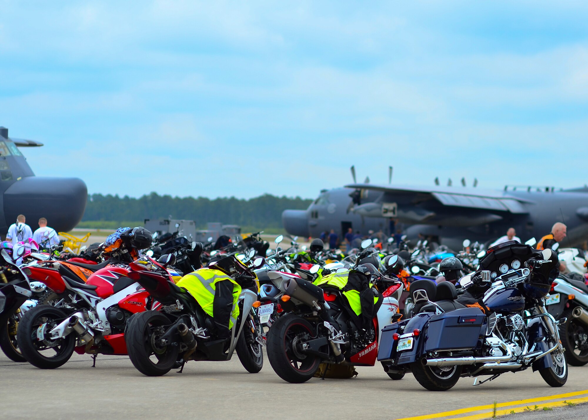 Parked motorcycles sit on the flight line on Hurlburt Field Fla., May 10, 2013. Active-duty, retired and DOD cardholders came out to attend the event, which included a brief on safety and use of proper personal protective equipment and an obstacle course ride demo by skilled riders from local law enforcement.
(U.S. Air Force Photo/ Staff Sgt. John Bainter)
