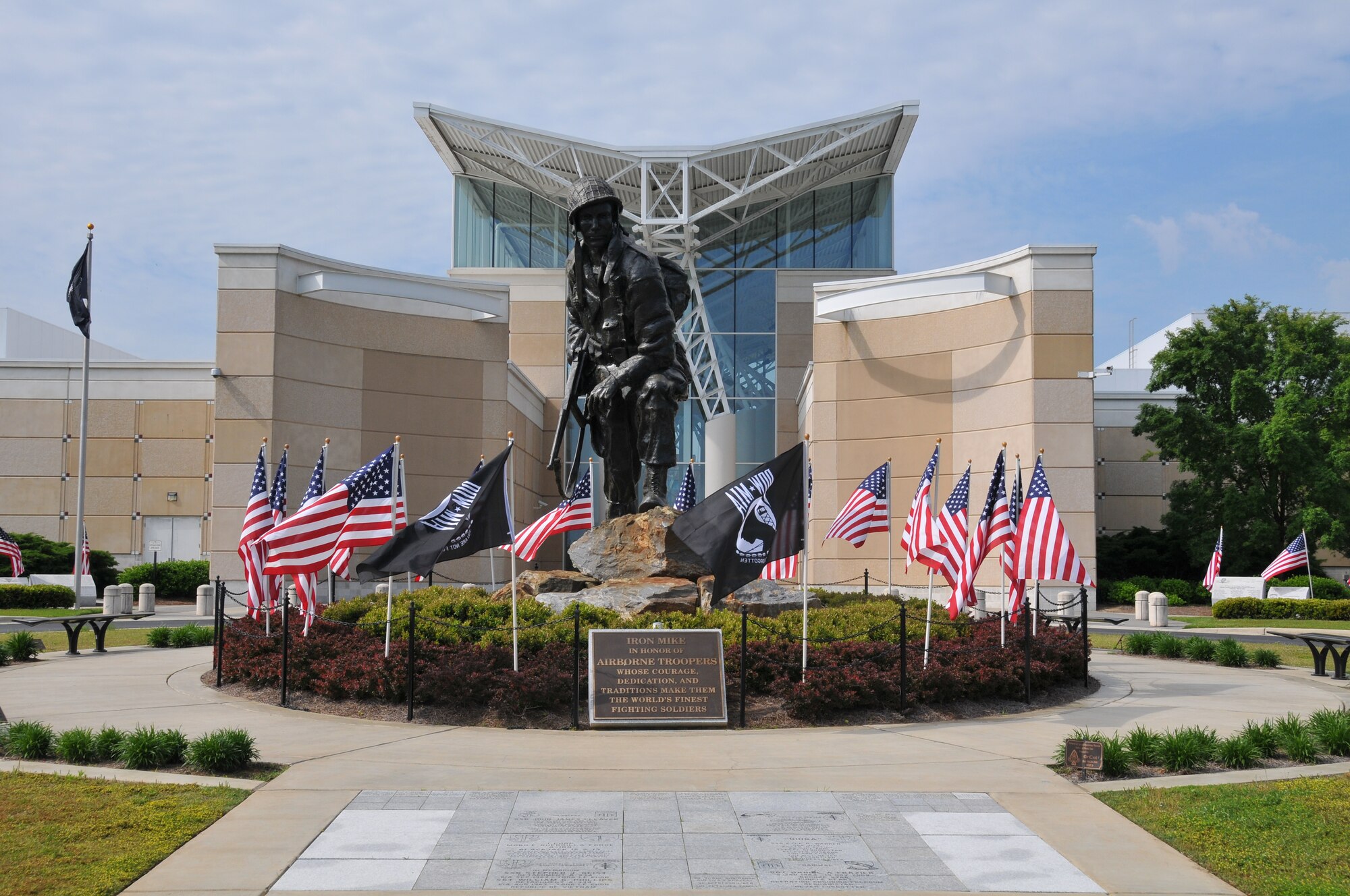 “Iron Mike” stands ready and watchful in front of the Airborne and Special Operations Museum in downtown Fayetteville, N.C.; the statue is surrounded by flags for the 7th annual Field of Honor, May 11, 2013.  The Fayetteville Field of Honor is one of largest and second longest running of its kind in the country.  Almost 1,000 flags stand in the field in front of the museum, each flag honors someone who is currently serving, has served, or made the ultimate sacrifice for our nation.  (U.S. Air Force photo by Adam Luther, 440 AW/PA)