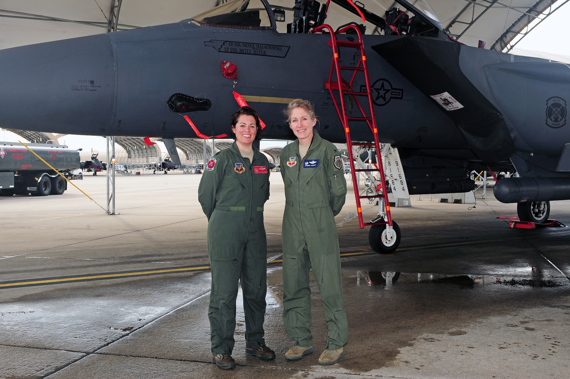 U.S. Air Force Lt. Col. Nicole Malachowski, left, 333rd Fighter Squadron commander, poses for a photo with Col. Jeannie Leavitt, 4th Fighter Wing commander, on Seymour Johnson Air Force Base, N.C., May 8, 2013. Malachowski has served as the commander of the 333rd FS since Nov. 18, 2011, and will relinquish command May 17, 2013. (U.S. Air Force photo by Airman 1st Class John Nieves Camacho/Released)