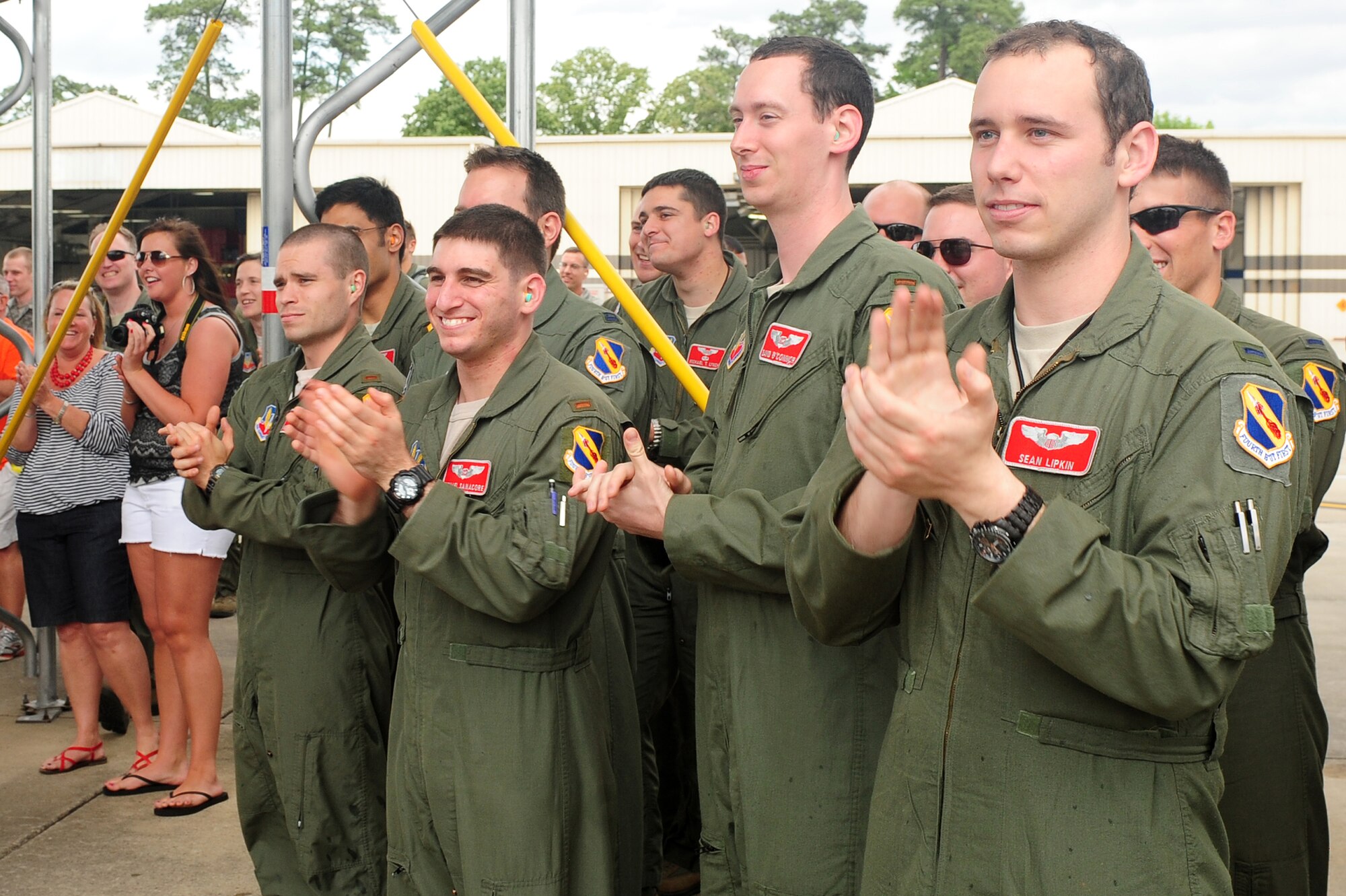 U.S. Air Force Airmen assigned to the 333rd Fighter Squadron welcome Lt. Col. Malachowski, 333rd FS commander, after her final flight on Seymour Johnson Air Force Base, N.C., May 8, 2013. A final flight refers to an aircrew member’s last sortie in the aircraft assigned to their current installation before permanently changing station or retiring. (U.S. Air Force photo by Airman 1st Class John Nieves Camacho/Released)