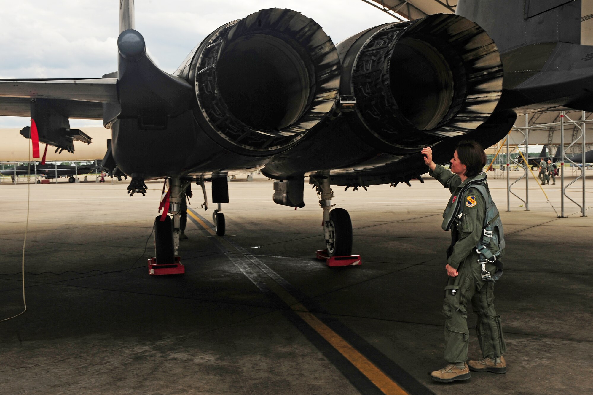 U.S. Air Force Lt. Col. Nicole Malachowski, 333rd Fighter Squadron commander, conducts a pre-flight inspection of an F-15E Strike Eagle on Seymour Johnson Air Force Base, N.C., May 8, 2013. Aircrew members conduct a physical inspection of the aircraft prior to flight to check for discrepancies and ensure serviceability. (U.S. Air Force photo by Airman 1st Class John Nieves Camacho/Released)