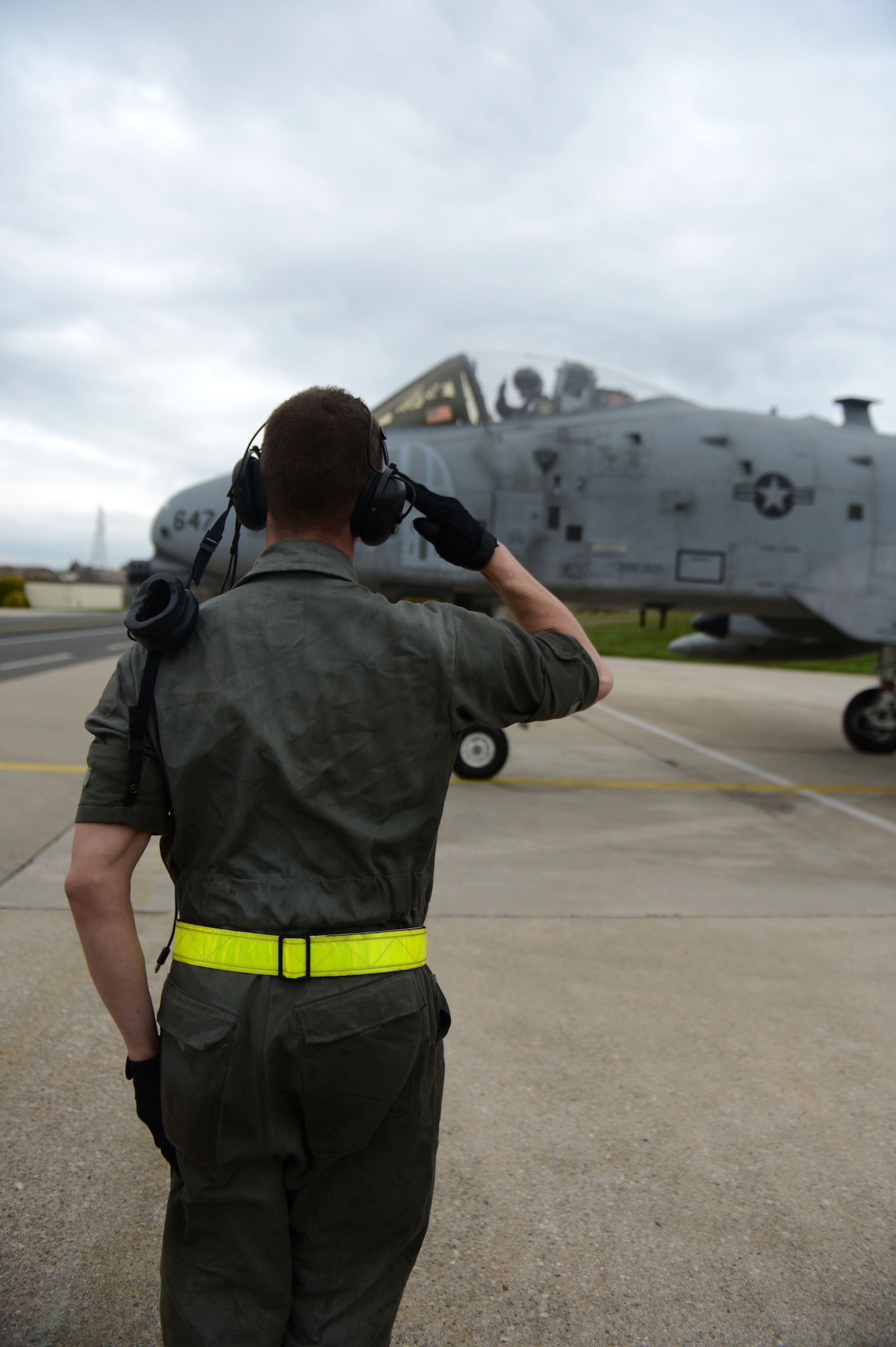 SPANGDAHLEM AIR BASE, Germany – U.S. Air Force Airman 1st Class Ethan Du Barton, 52nd Aircraft Maintenance Squadron crew chief from Kingman, Ariz., salutes U.S. Air Force Capt. Gregory Ulrich, 81st Fighter Squadron pilot from Fairfield, Calif. as he takes part in the final A-10 Thunderbolt II tactical sortie May 14, 2013. Flying hours across the Air Force are being reduced; however, pilots strive to maintain their proficiency by training at every opportunity. (U.S. Air Force photo by Airman 1st Class Gustavo Castillo/Released)
