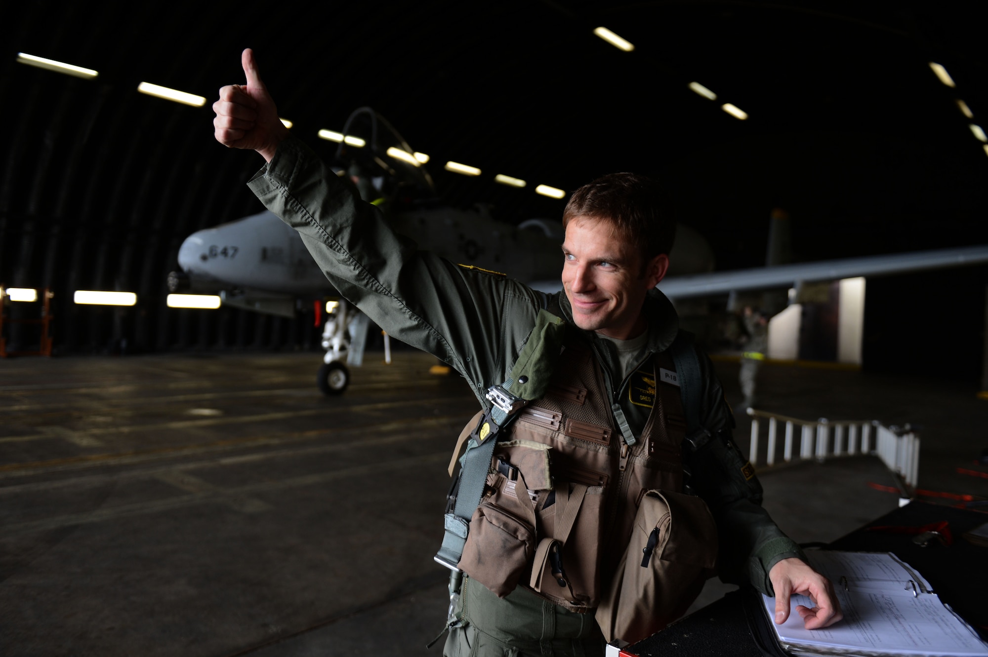 SPANGDAHLEM AIR BASE, Germany – U.S. Air Force Capt. Gregory Ulrich, 81st Fighter Squadron pilot from Fairfield, Calif., gives a thumbs-up on the flightline before departing for a tactical sortie May 14, 2013. This was the final A-10 Thunderbolt II attack aircraft tactical sortie in Europe at Spangdahlem AB. (U.S. Air Force photo by Airman 1st Class Gustavo Castillo/Released)