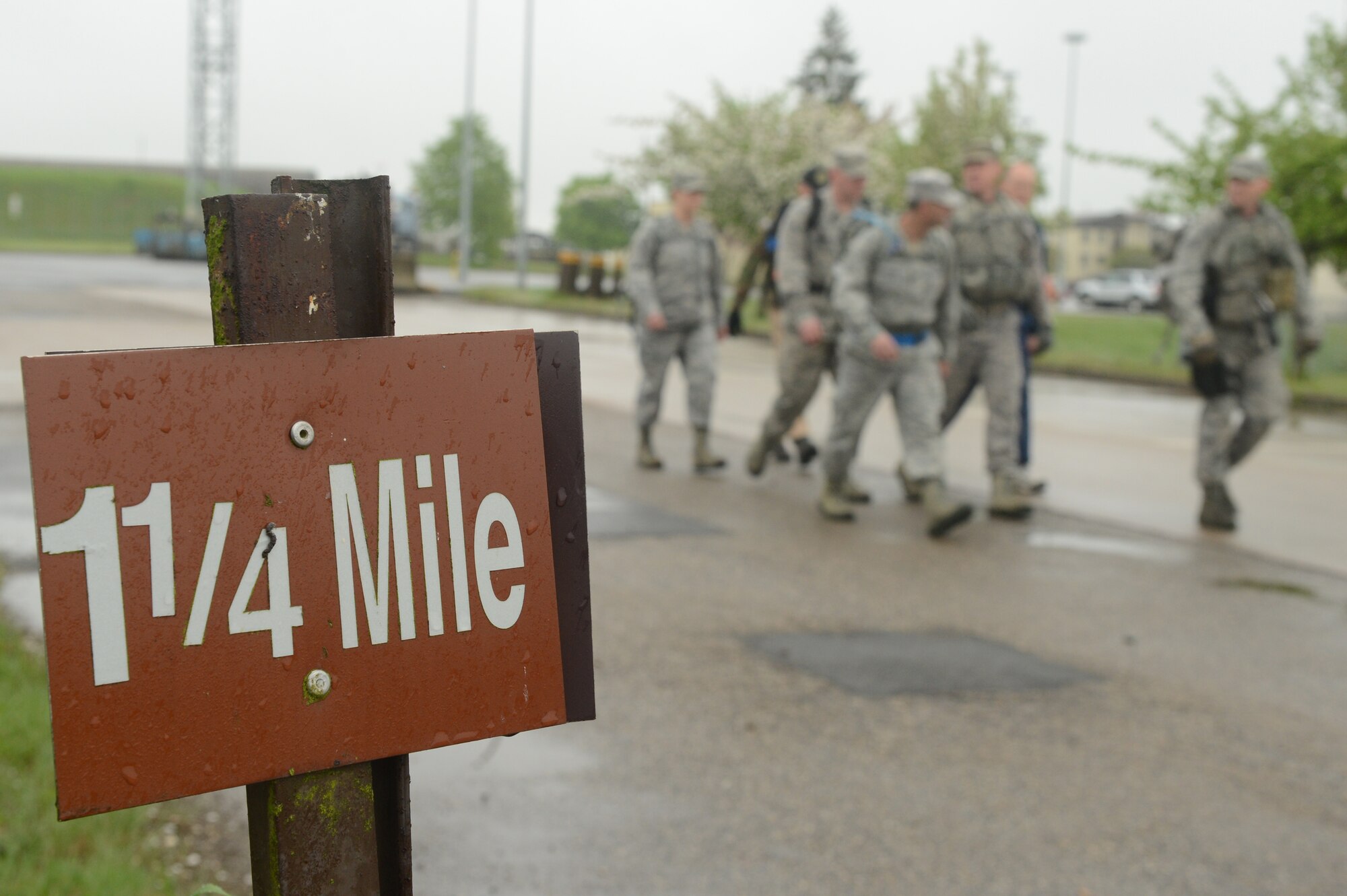 SPANGDAHLEM AIR BASE, Germany -- U.S. Air Force Airmen participate in a 6-mile ruck march May 13, 2013. National Police Week is held every May to honor law enforcement officers who died in the line of duty. (U.S. Air Force photo by Airman 1st Class Kyle Gese/Released)
