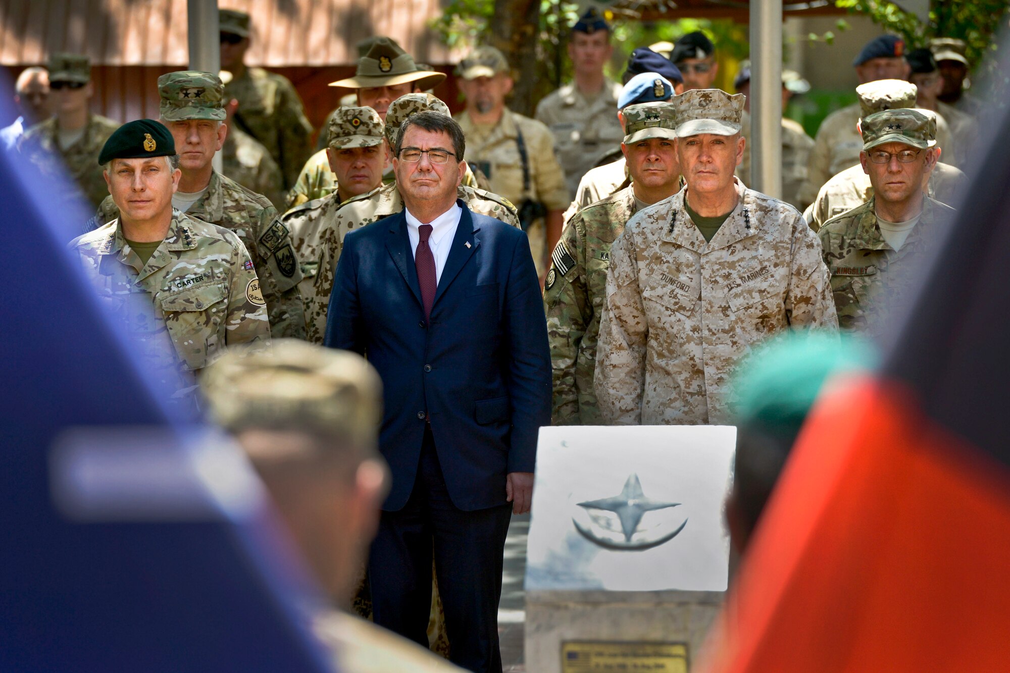 Deputy Defense Secretary Ash Carter and Marine Corps Gen. Joseph F. Dunford Jr., commander of the International Security Assistance Force and U.S. Forces Afghanistan, join with U.S. and Afghan security forces in a weekly memorial service to honor fallen troops in Kabul, Afghanistan, May 12, 2013. The names of both U.S. and Afghan forces were read aloud. (DOD photo by Glenn Fawcett/Released)
