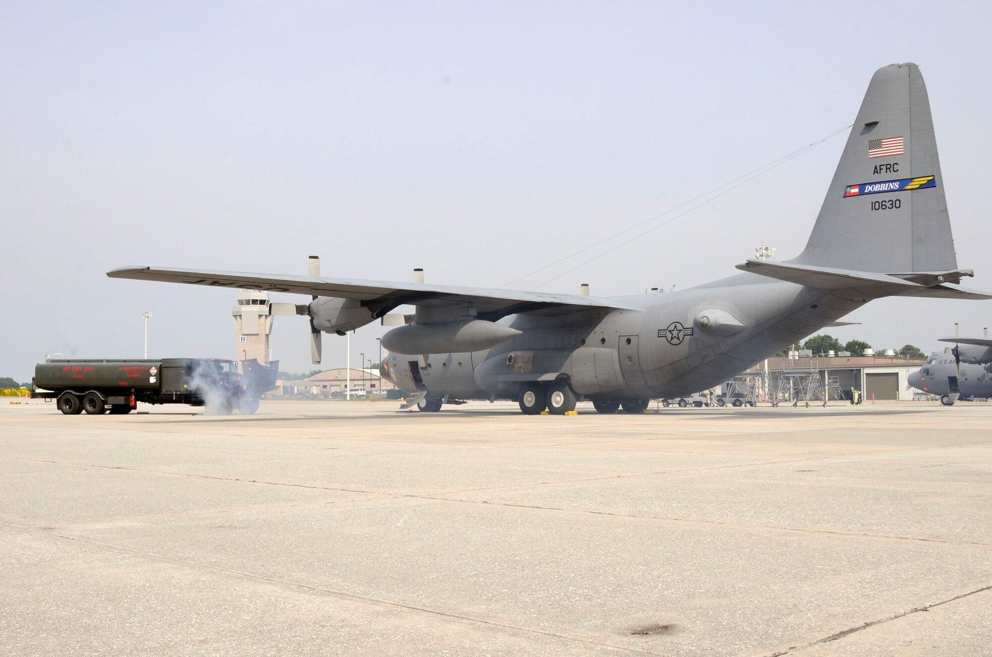 A major accident response exercise (MARE) simulating an incident where an aircraft refueling truck collided with a parked C-130 Hercules was conducted on Dobbins Air Reserve Base, Ga.  May 10. The scenario evaluated the response time and operating procedures of first responders, and explosive ordnance personnel from the 94th Airlift Wing. (U.S. Air Force photo/Don Peek)