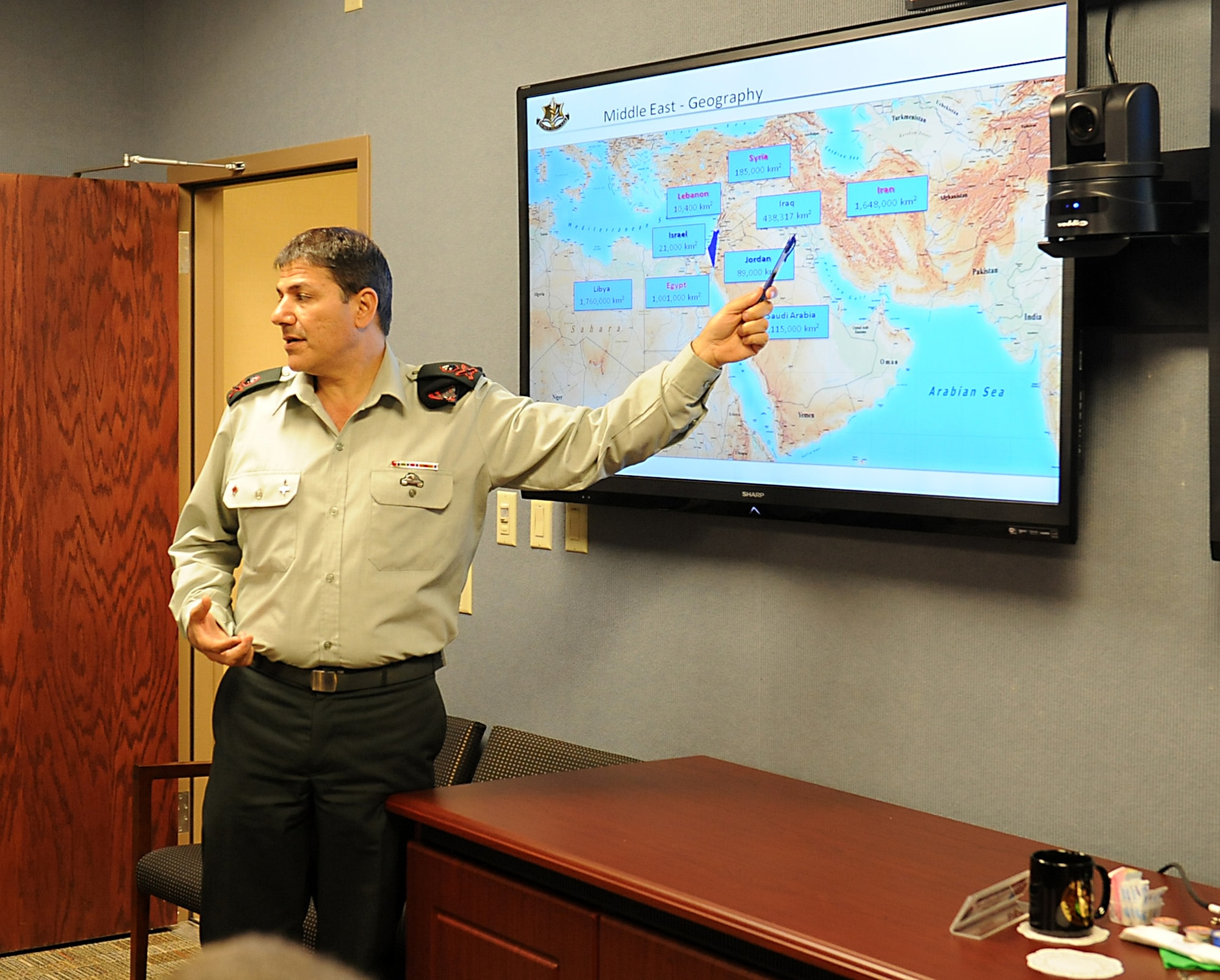 Israeli Defense Force Maj. Gen. Yaakov Ayish, defense attaché to the U.S. and Canada, briefs trends that are currently going on in the Middle East and the greatest threats to Israel to Joint Task Force Civil
Support senior leaders during an Israeli Defense Force Home Front Command visit at Fort Eustis, Va., May 7, 2013. Ayish and his staff spent the day learning the wide variety of life-saving and sustaining response capabilities that JTF-CS oversees if ordered to respond to a catastrophic chemical, biological,
radiological or nuclear incident in the homeland. (DOD photo by U.S. Navy Petty Officer 1st Class Brian Dietrick/Released)
