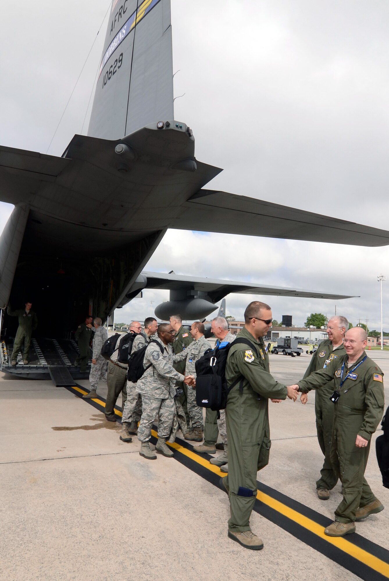 Inspector General Teams arrive on Dobbins Air Reserve Base, Ga., and greeted by Col. Tim Tarchick, 94th Airlift Wing commander, Chief Master Sgt. Wendell L. Peacock 94AW command chief, and group and squadron commanders, May 7. The IG Teams will be on Dobbins conducting a Consolidated Unit Inspection (CUI) on units within the wing.  The inspection will take roughly a week to complete, with total compliance as the wing goal. (U.S. Air Force photo/Don Peek)