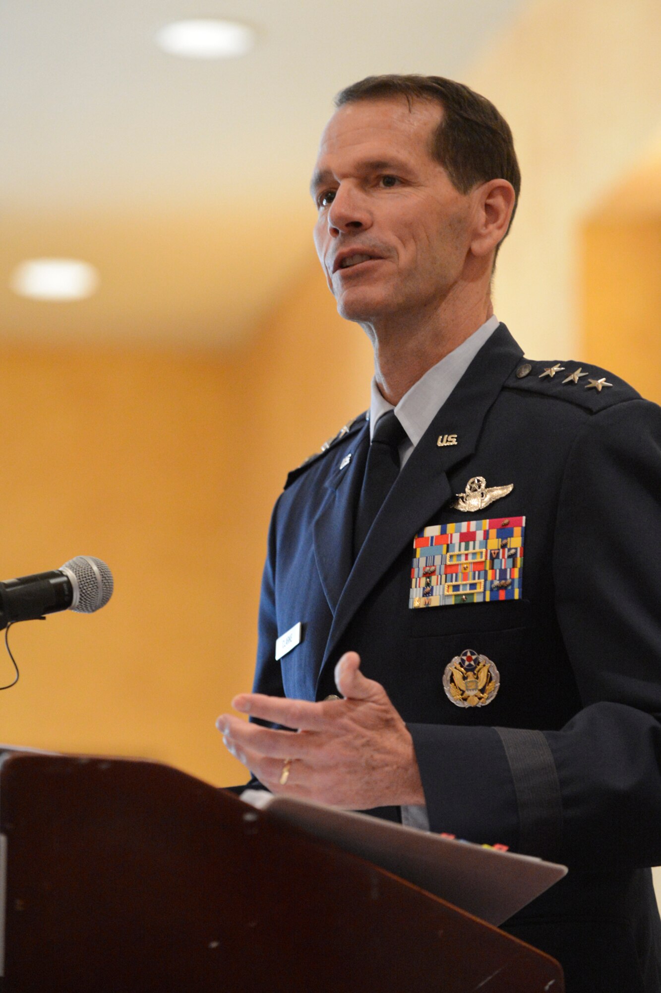 Lt. Gen. Stanley E. Clarke III, the director of the Air National Guard addresses the audience during the 2013 Military Spouse of the Year award ceremony, in Arlington, Va., May 9, 2013. Alicia Hinds Ward, 2013 National Guard Spouse of the Year, won the 2013 Military Spouse of the Year award. The award, presented by Military Spouse magazine and sponsored by Armed Forces Insurance, honors spouses of military members. (Air Force photo by Scott Ash/RELEASED)