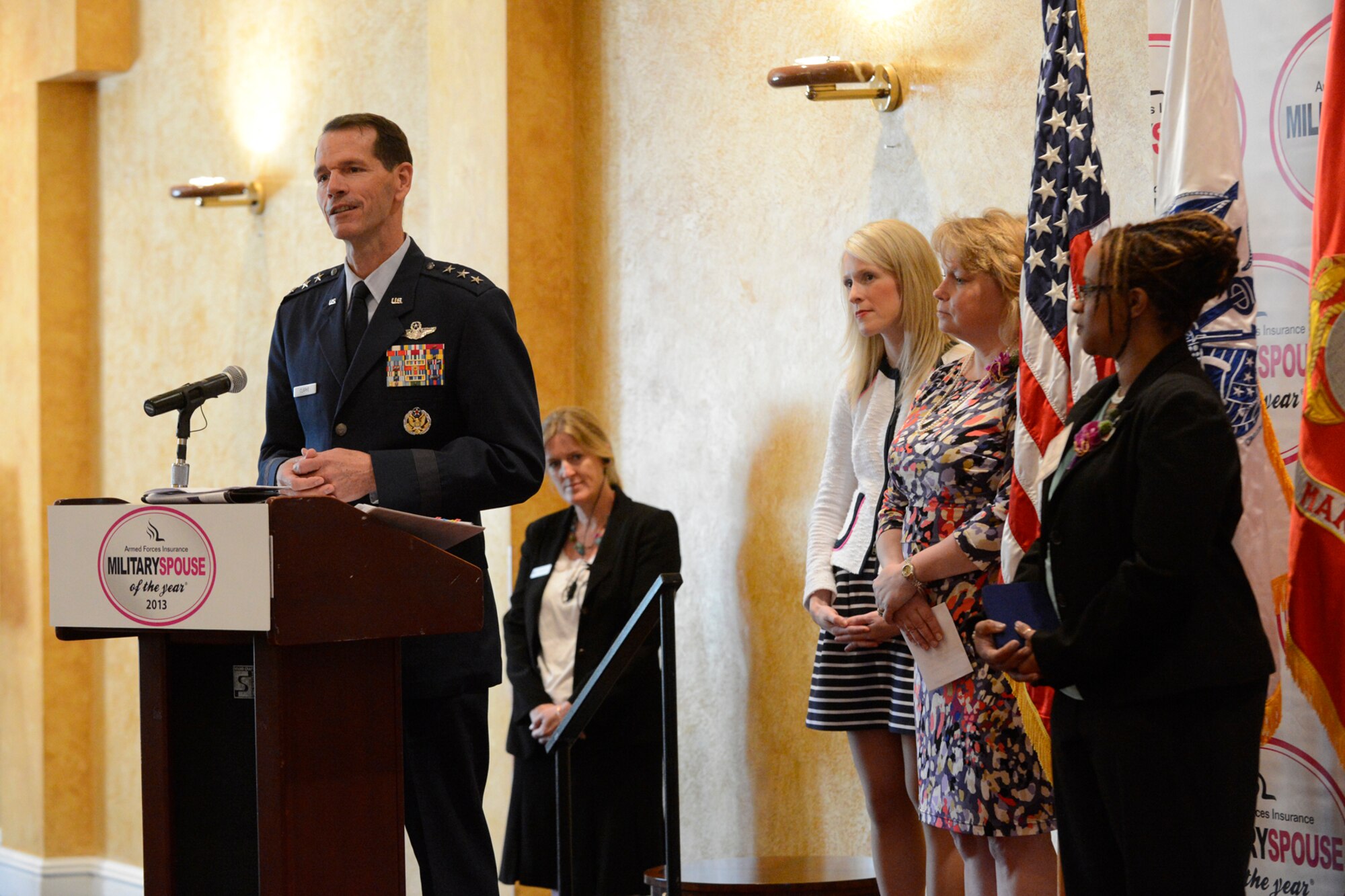 Lt. Gen. Stanley E. Clarke III, the director of the Air National Guard addresses the audience during the 2013 Military Spouse of the Year award ceremony, in Arlington, Va., May 9, 2013. Alicia Hinds Ward, 2013 National Guard Spouse of the Year, won the 2013 Military Spouse of the Year award. The award, presented by Military Spouse magazine and sponsored by Armed Forces Insurance, honors spouses of military members. (Air Force photo by Scott Ash/RELEASED)