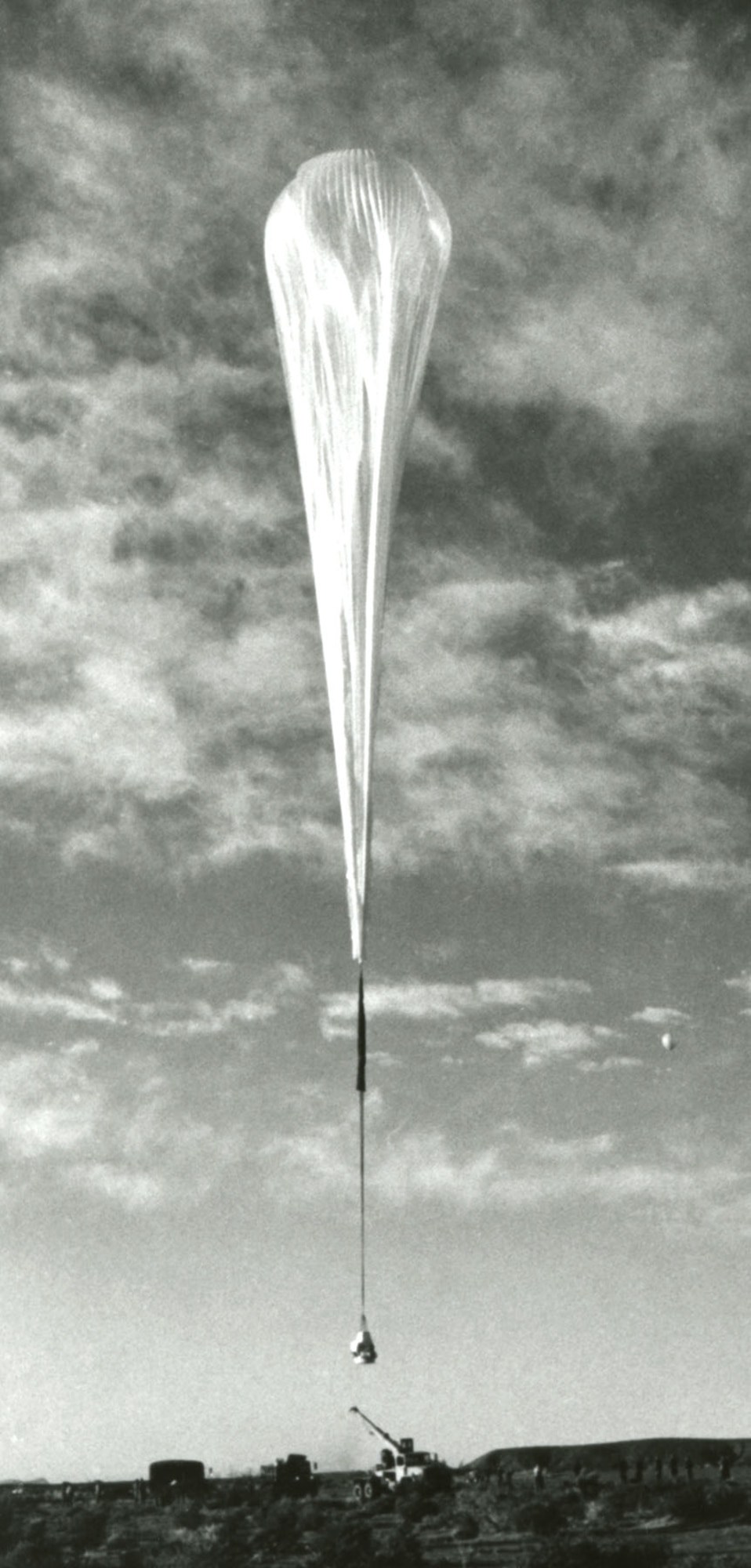 Beginning the ascent in the Excelsior III gondola. As the balloon rises into the upper atmosphere, the helium gas inside expands and fills out the envelope of the balloon.  The tests were carried out over the barren terrain of New Mexico. (U.S. Air Force photo)