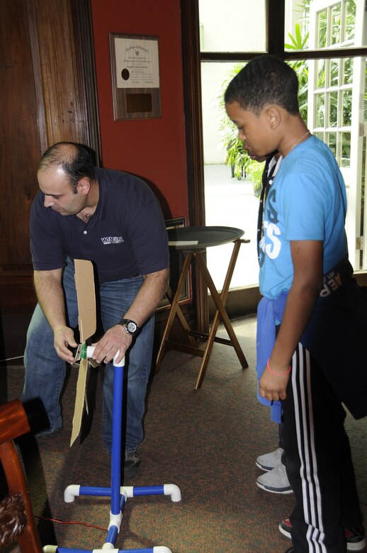 Members from the U.S. Army Corps of Engineers, Baltimore District partnered with the Society of American Military Engineers to create "Easy as Pi," a STEM event for over 80 students from 8 Maryland counties. The students had the chance to dissect a squid with the National Aquarium, conduct forensic testing, compete to build the most powerful fan, and more.