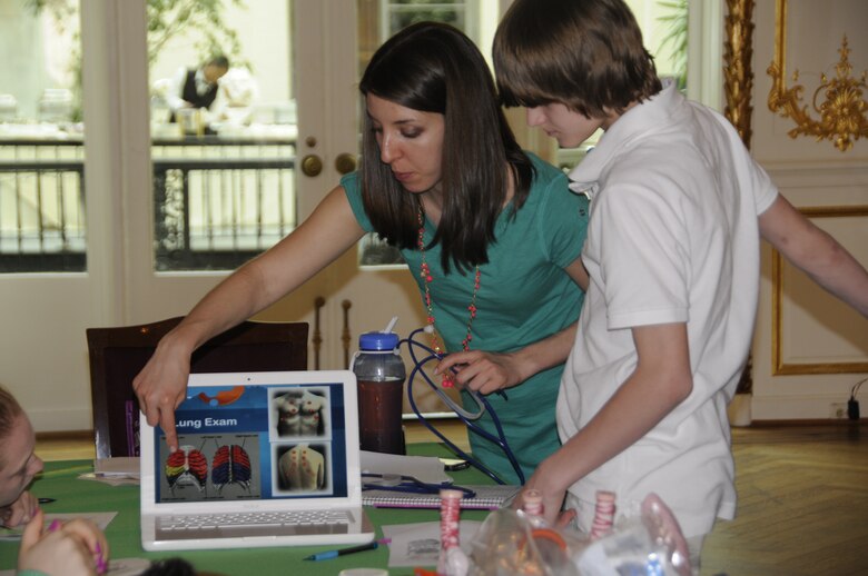 Members from the U.S. Army Corps of Engineers, Baltimore District partnered with the Society of American Military Engineers to create "Easy as Pi," a STEM event for over 80 students from 8 Maryland counties. The students had the chance to dissect a squid with the National Aquarium, conduct forensic testing, compete to build the most powerful fan, and more.