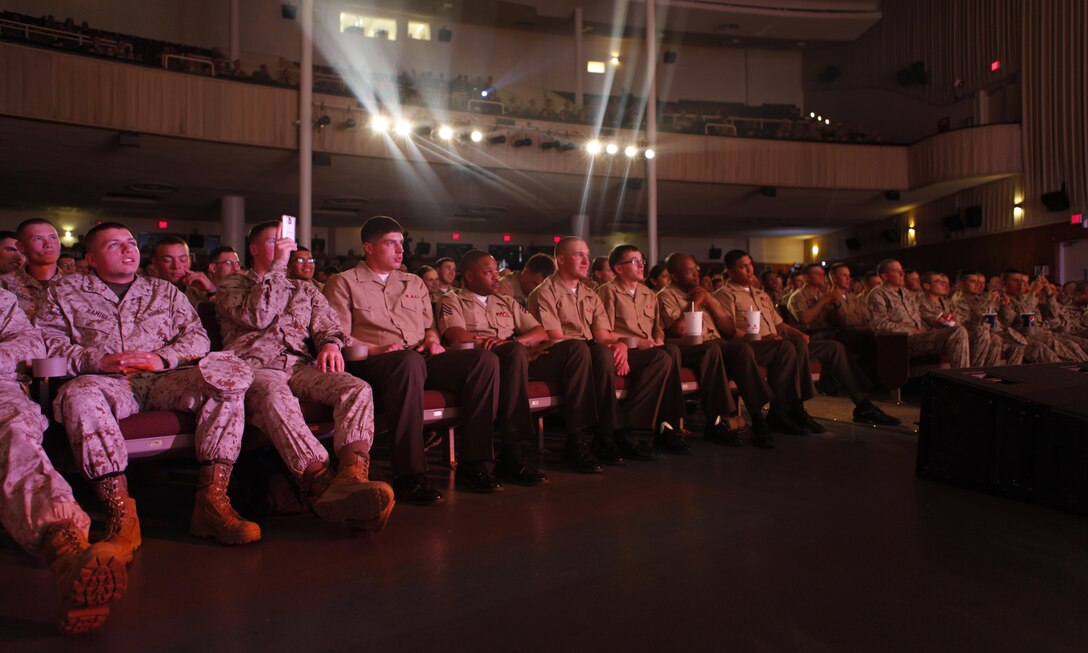 Marine Corps Installations East Marines pay attention to the comedians during the Leathernecks II Comedy and Entertainment Tour at the base theater aboard Marine Corps Base Camp Lejeune April 5. The Single Marine Program created this tour to entertain Marines. (Photo by Pfc. Justin A. Rodriguez/released)