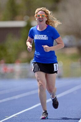 Retired Tech. Sgt. Kathryn Robinson of Detroit, Mich., competes in the track and field competition May 14, 2013 at the Air Force Academy track during the Warrior Games. Robinson is competing in both the track and field and swimming events this year. (U.S. Air Force photo/Mike Kaplan)