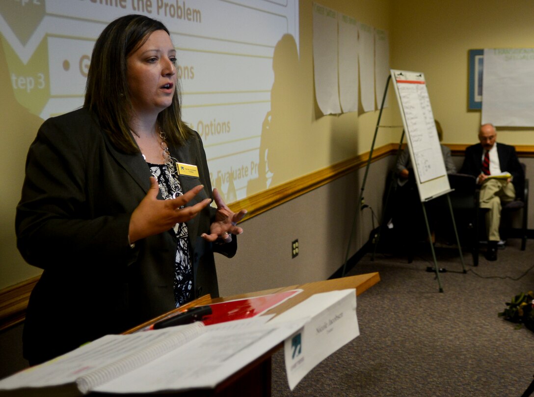 Nicole Jacobsen, Transition Assistance Program trainer, explains resume writing techniques during a TAP class at Langley Air Force Base, Va., May 13, 2013. In addition to resume writing, students also learned about the interview process, job searching, networking techniques and more. (U.S. Air Force photo by Airman 1st Class Austin Harvill/Released)
