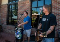 The Larry David Band performs during the Rookies Sports Grill one-year anniversary May 8, 2013, at Joint Base Charleston – Air Base, S.C. The event included a live band, hot dog eating contest and buffet for service members, retirees and their families to try out new menu options.  (U.S. Air Force photo/ Senior Airman Dennis Sloan)