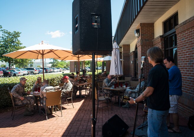 The Larry David Band performs during the Rookies Sports Grill one-year anniversary May 8, 2013, at Joint Base Charleston – Air Base, S.C. The event included a live band, hot dog eating contest and buffet for service members, retirees and their families to try out new menu options. (U.S. Air Force photo/ Senior Airman Dennis Sloan)