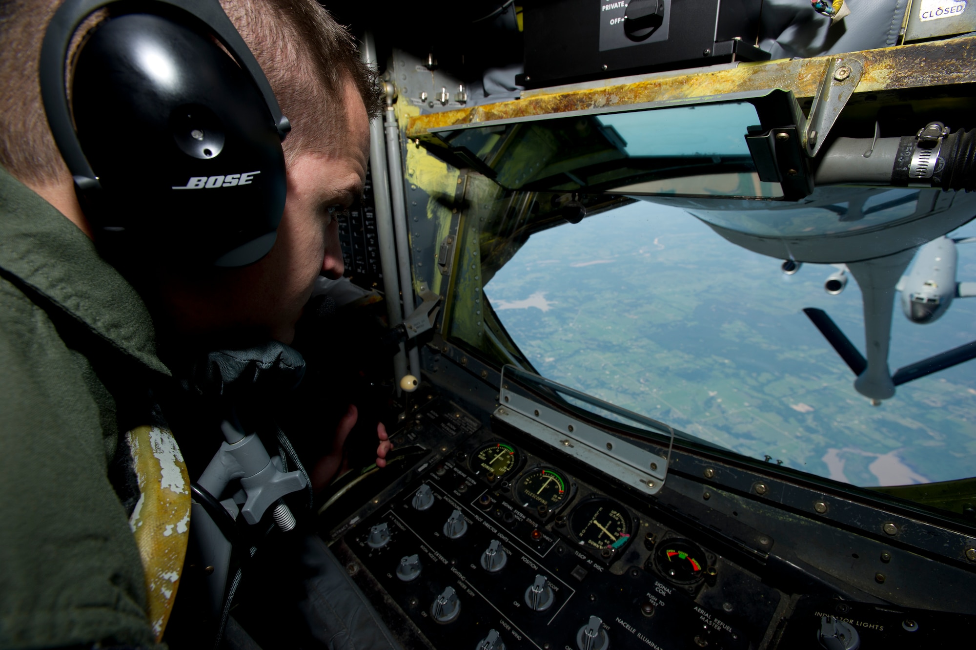 One of McConnell’s boom operator prepares to refuel a KC-135 Stratotanker May 14, 2013. During this flight, the boom operator helped train pilots in proper refueling procedures. (U.S. Air Force Photo/Senior Airman Armando A. Schwier-Morales)