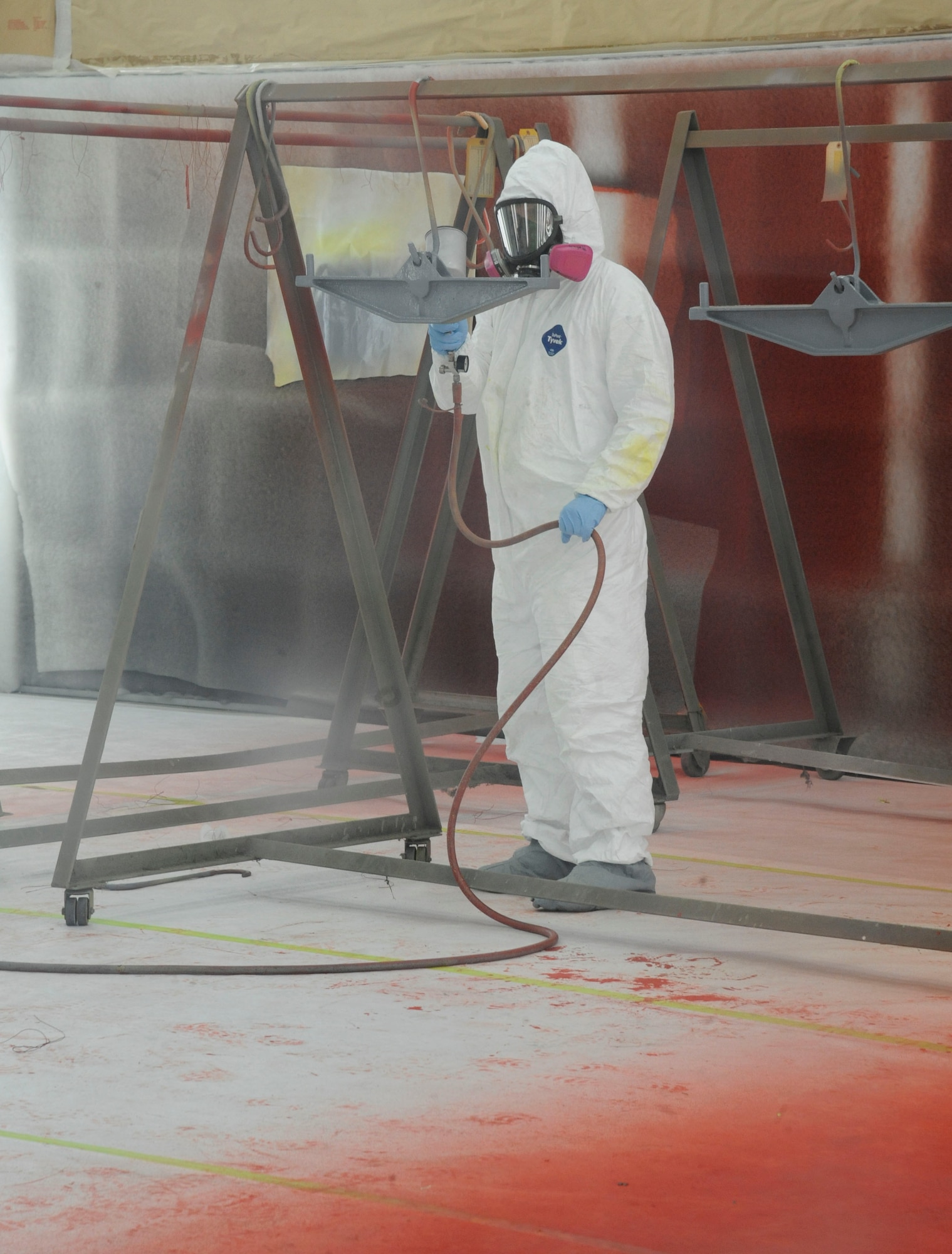 Airman 1st Class Wesley Harvin, 2nd Maintenance Squadron Fabrication Flight paint shop, paints B-52H Stratofortress components on Barksdale Air Force Base, La., May 15, 2013. The shop provides preventative maintenance for 2nd MXS by using a corrosion resistant paint on aircraft parts in order to prevent corrosion damage. (U.S. Air Force photo/Airman 1st Class Andrew Moua)