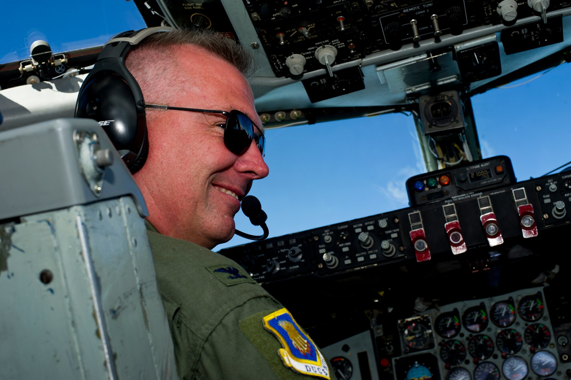 Col. Ricky Rupp, 22nd Air Refueling Wing commander, listens to his co-pilot during a Rupp’s final mission at McConnell AFB May 14, 2013. Military aviators have a tradition where aircrew members, upon completion of their final flight or "fini flight," are greeted and hosed down with water by their wing comrades, family and friends. (U.S. Air Force Photo/Senior Airman Armando A. Schwier-Morales)