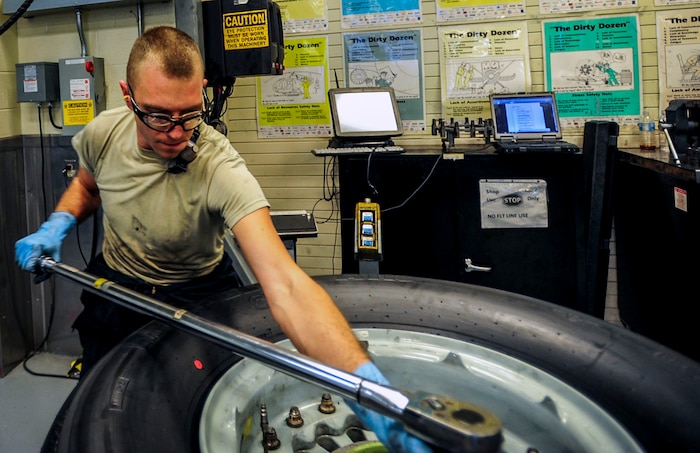Staff Sgt. Justin Brandt, 437th Maintenance Squadron repair and reclamation specialist,  uses a torque wrench to put the finishing touches on a reassembled C-17 Globemaster III wheel and tire May 14, 2013, at Joint Base Charleston – Air Base, S.C.. Once complete, the wheel and tire will be sent to supply and distributed as needed. The 437th MXS Repair and Reclamation shop is trained and equipped to be dispatched on short notice to crash sites for aircraft recovery.  (U.S. Air Force photo / Airman 1st Class Tom Brading)