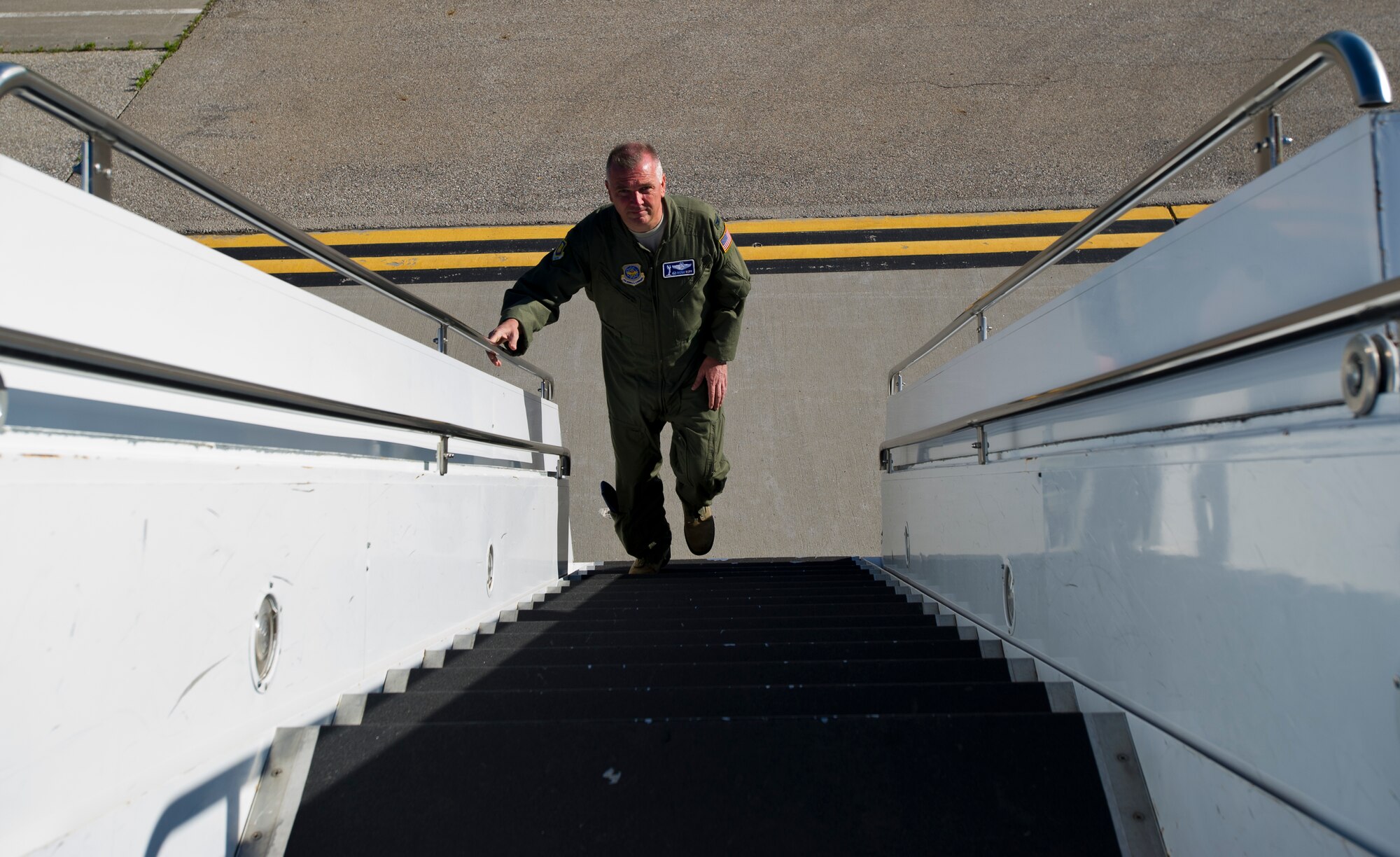 Col. Ricky Rupp, 22nd Air Refueling Wing commander, climbs aboard a KC-135 Stratotanker for his “fini flight” May 14, 2013, McConell Air Force Base, Kan. After two years as the 22nd ARW commander Rupp will depart for a new assiment at the end the month.  (U.S. Air Force Photo/Senior Airman Armando A. Schwier-Morales)