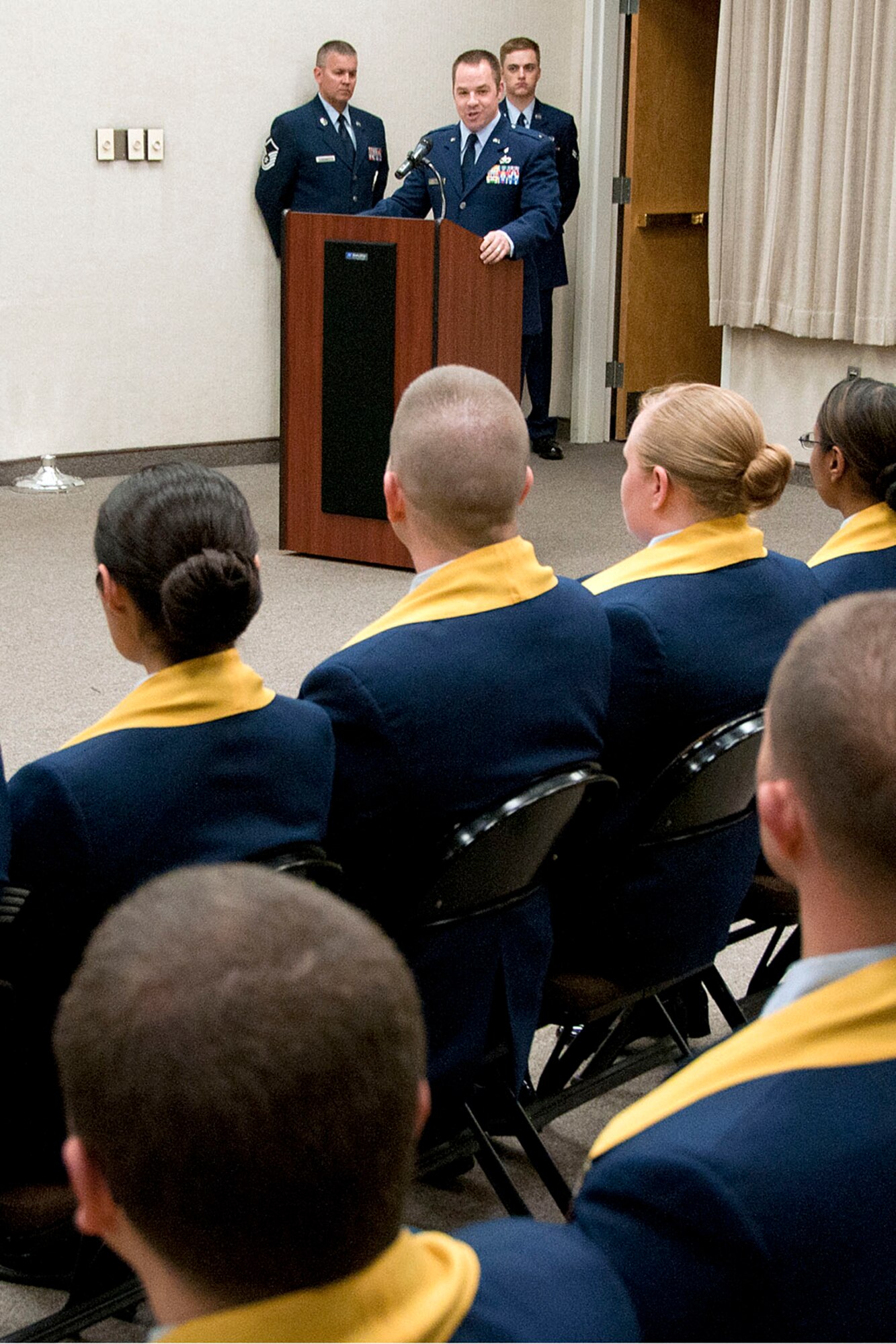 HANSCOM AIR FORCE BASE, Mass. -- First Lt. Samuel F. Sells, 66th Medical Squadron, Medical Logistics Element leader, delivers the Community College of the Air Force graduation commencement address at the Hanscom Conference Center May 10. Sells, a CCAF graduate who was recently accepted into the Air Force Institute of Technology program, discussed with graduates his educational journey since enlisting in the Air Force in 2003. (U.S. Air Force photo by Mark Wyatt)