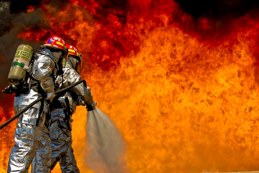 U.S. Air Force firefighters from the 182nd Civil Engineer Squadron combat a kerosene-based JP-8 jet fuel fire at the 182nd Airlift Wing in Peoria, Ill., May 13, 2013.  The firefighters tested the capabilities of their P-34 Rapid Intervention Vehicle during a controlled burn exercise using ultra-high pressure water dispersal technology.  According to the Air Force Civil Engineer Support Agency, the P-34 increases water effectiveness by up to 350 percent as compared to conventional firefighting vehicles in the Air Force’s fleet.  (U.S. Air National Guard photo by Staff Sgt. Lealan Buehrer/Released)