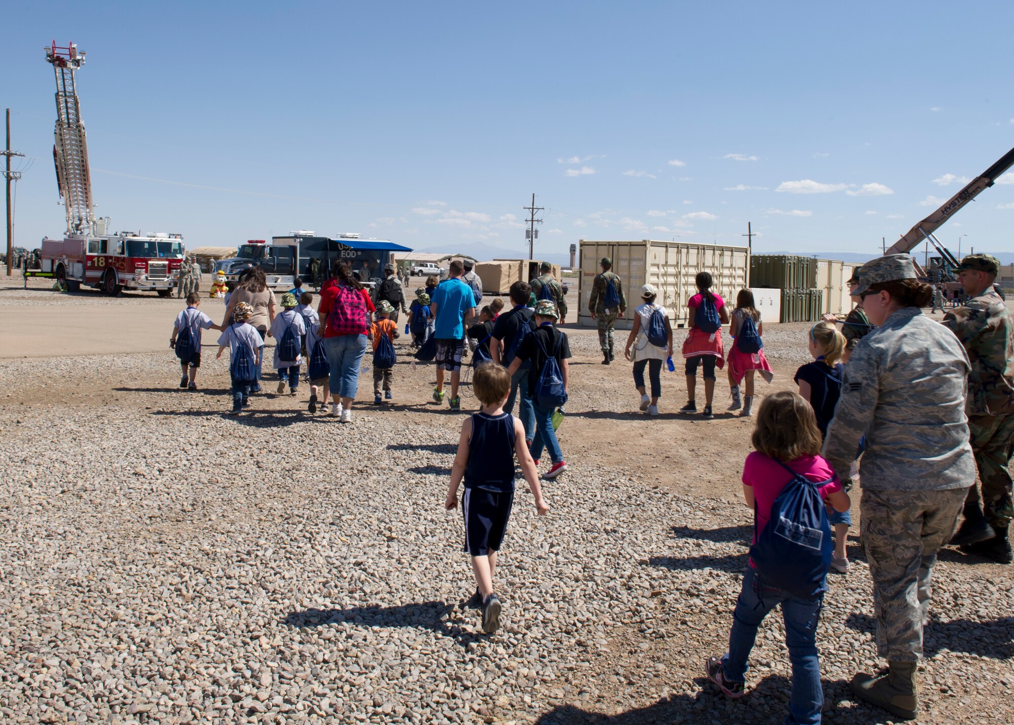 The “deployers” arrive at “Bearghanistan” during Operation Kids Investigating Deployment at Holloman Air Force Base, N.M., May 13. Operation K.I.D. gave the “deployers” an inside look at what their parents go through when called to deploy. (U.S. Air Force photo by Senior Airman Kasey Close/Released)