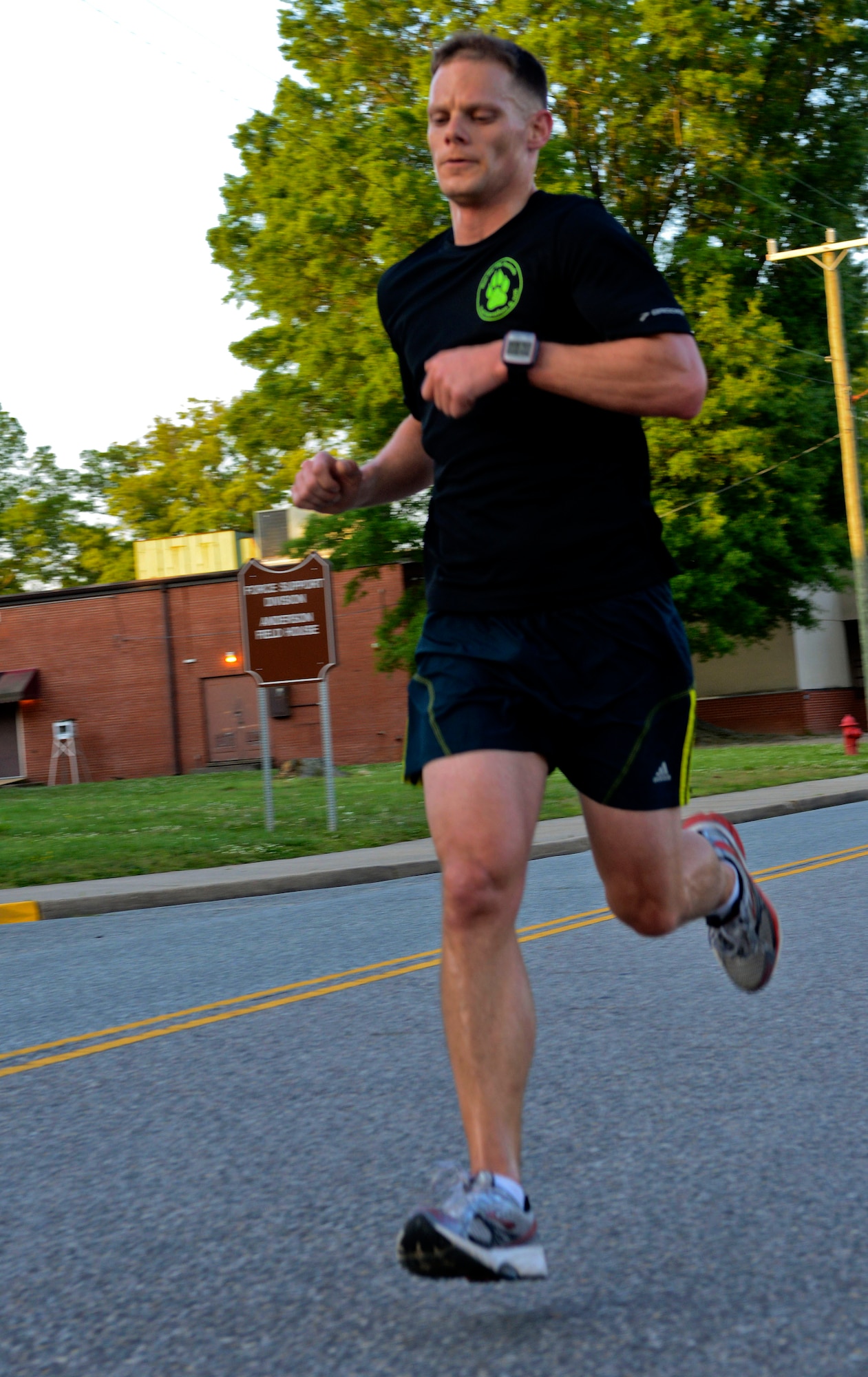 U.S. Army Capt. Zach Valentine, 1st Battalion, 210th Aviation Regiment B company commander, sprints toward the finish line during the Fort Eustis Running Club’s Army Ten-Miler team tryouts at Fort Eustis, Va., May 15, 2013. The club will host a second tryout this summer to finalize its team for the annual 10-mile race, held each October in Washington, D.C. (U.S. Air Force photo by Airman 1st Class R. Alex Durbin/Released)