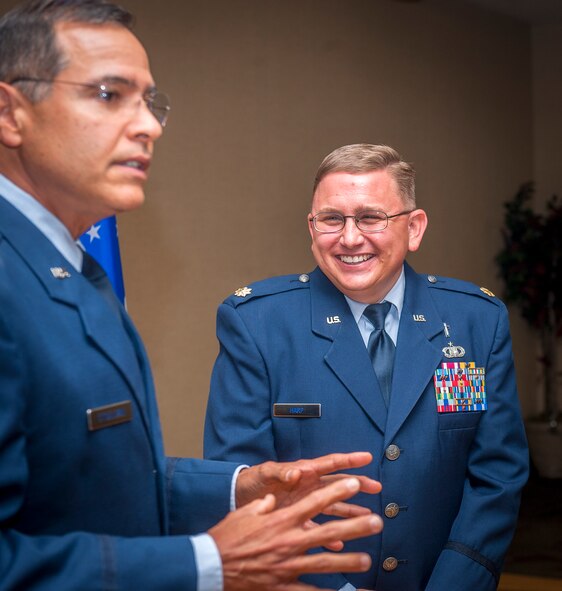 U.S. Air Force Chaplain (Maj.) Erik Harp, 93d Air Ground Operations Wing chaplain, smiles as Chaplain (Lt. Col.) Bill O’Sullivan, the division chief of personnel and readiness at Air Force Reserve Command, tells stories about Harp at Moody Air Force Base, Ga., April 30, 2013. Harp and O’Sullivan worked together more than 15 years ago when Harp was a chaplain assistant. (U.S. Air Force photo by Senior Airman Jarrod Grammel/Released)
