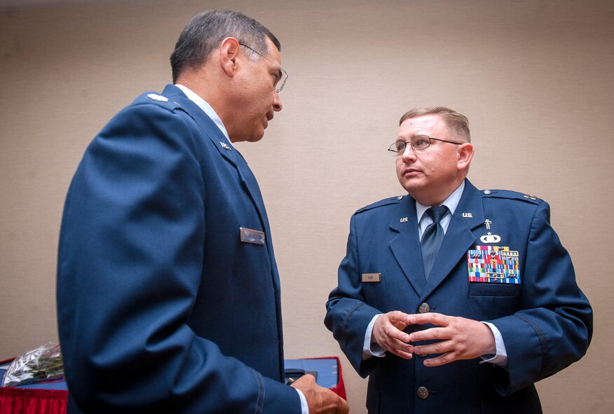 U.S. Air Force Chaplain (Maj.) Erik Harp, 93d Air Ground Operations Wing chaplain, talks to Chaplain (Lt. Col.) Bill O’Sullivan, the division chief of personnel and readiness at Air Force Reserve Command, during Harp’s promotion ceremony at Moody Air Force Base, Ga., April 30, 2013. Harp and O’Sullivan worked together from 1994 to 1997. (U.S. Air Force photo by Senior Airman Jarrod Grammel/Released)
