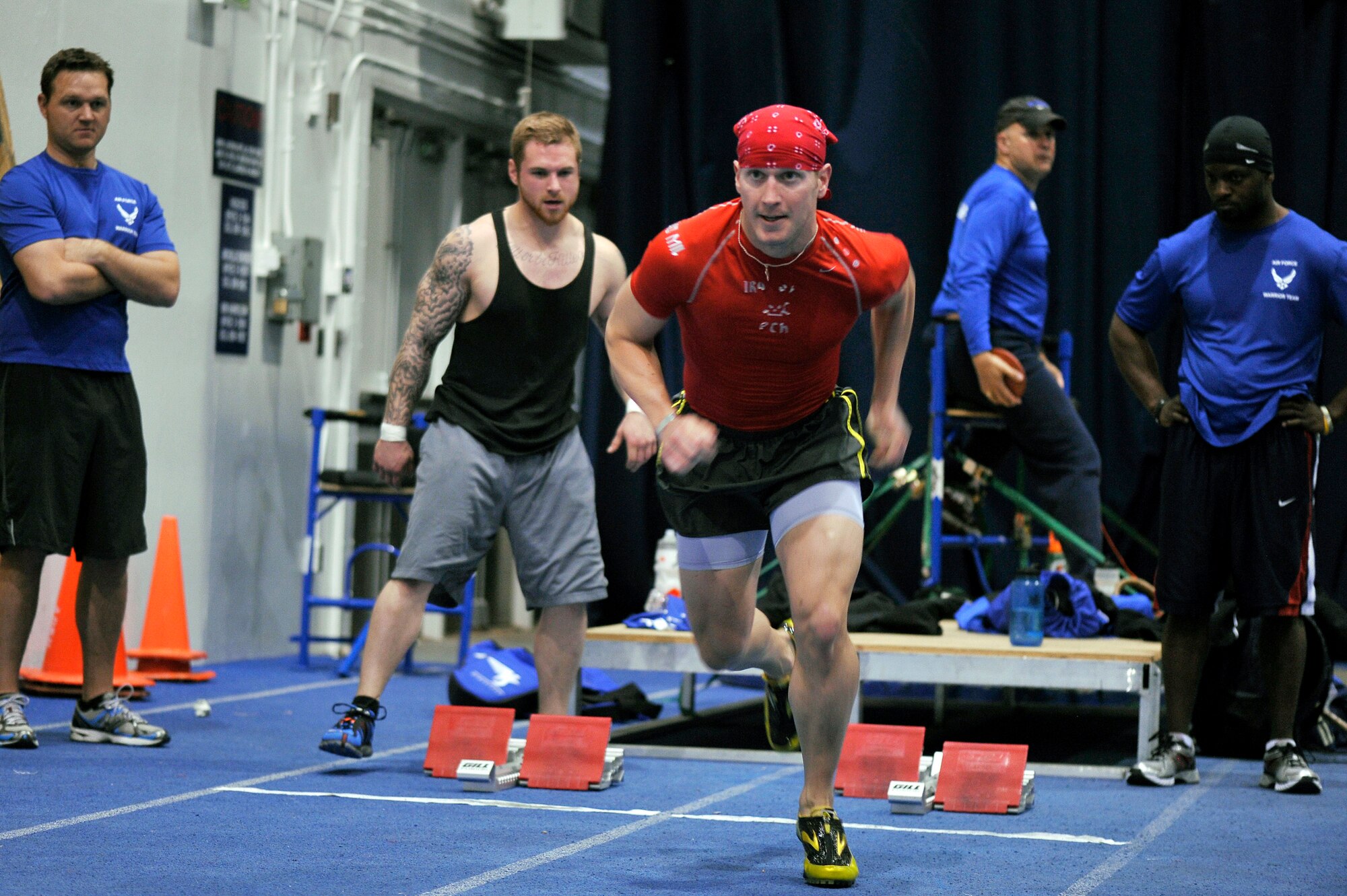 Capt. Mitchell Kieffer sprints at the Academy indoor track during the Wounded Warrior Games Training Camp held in Colorado Springs, Colo., April 17, 2013. (U.S. Air Force photo/Desiree N. Palacios)
