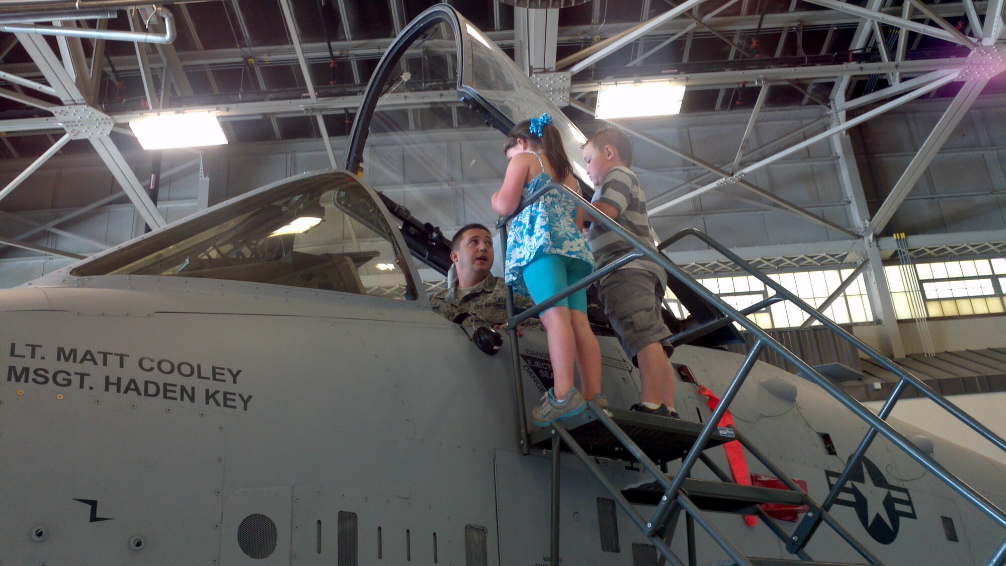 A group of kindergarteners from Alma Primary School get to peek inside the cockpit of an A-10C Thunderbolt II “Warthog” during a tour of the 188th Fighter Wing May 14, 2013. (U.S. Air National Guard photo by Maj. Heath Allen/188th Fighter Wing)