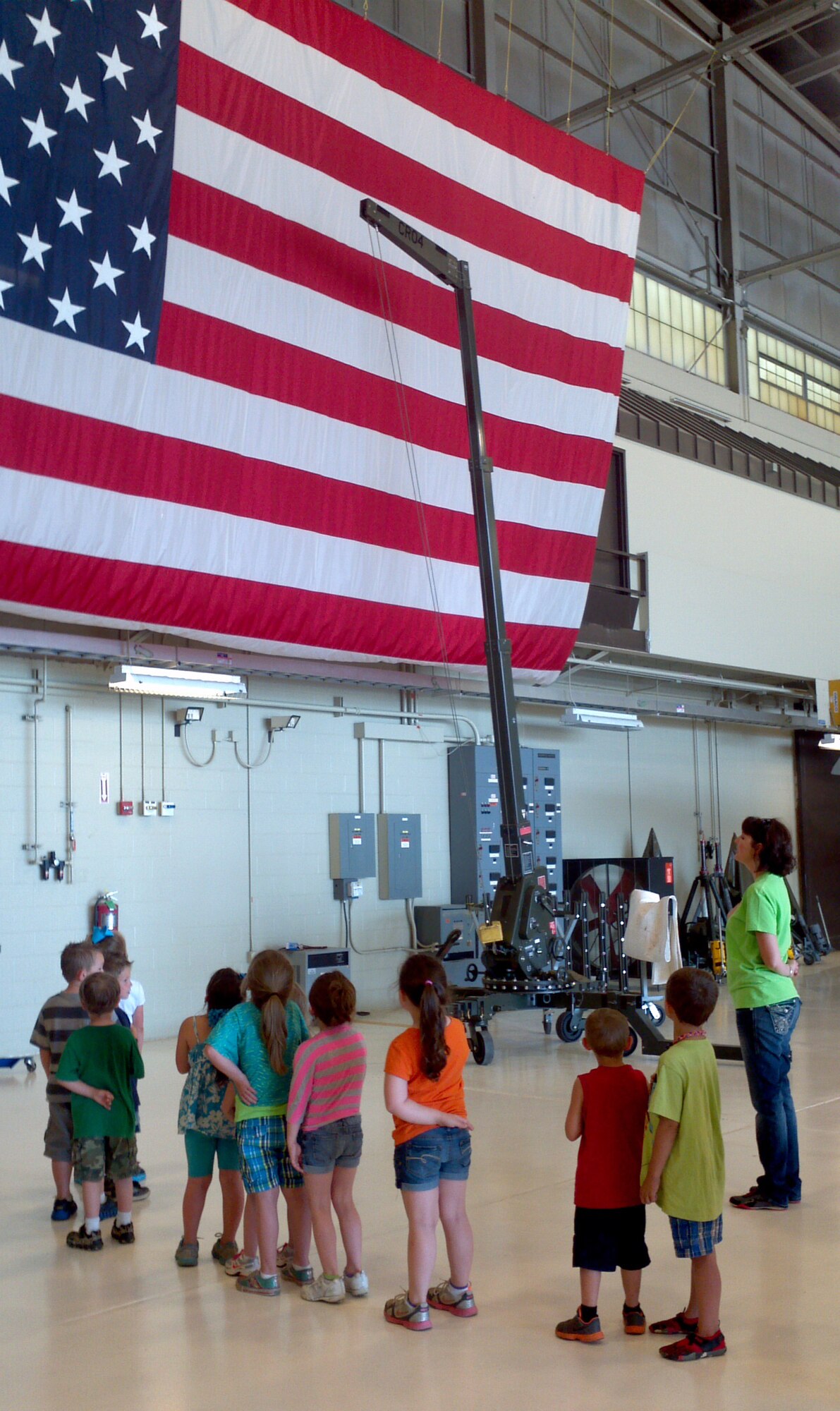 A group of kindergarteners from Alma Primary School recite the Pledge of Allegiance in the 188th Fighter Wing’s main hangar during a tour of the wing May 14, 2013. (U.S. Air National Guard photo by Maj. Heath Allen/188th Fighter Wing)